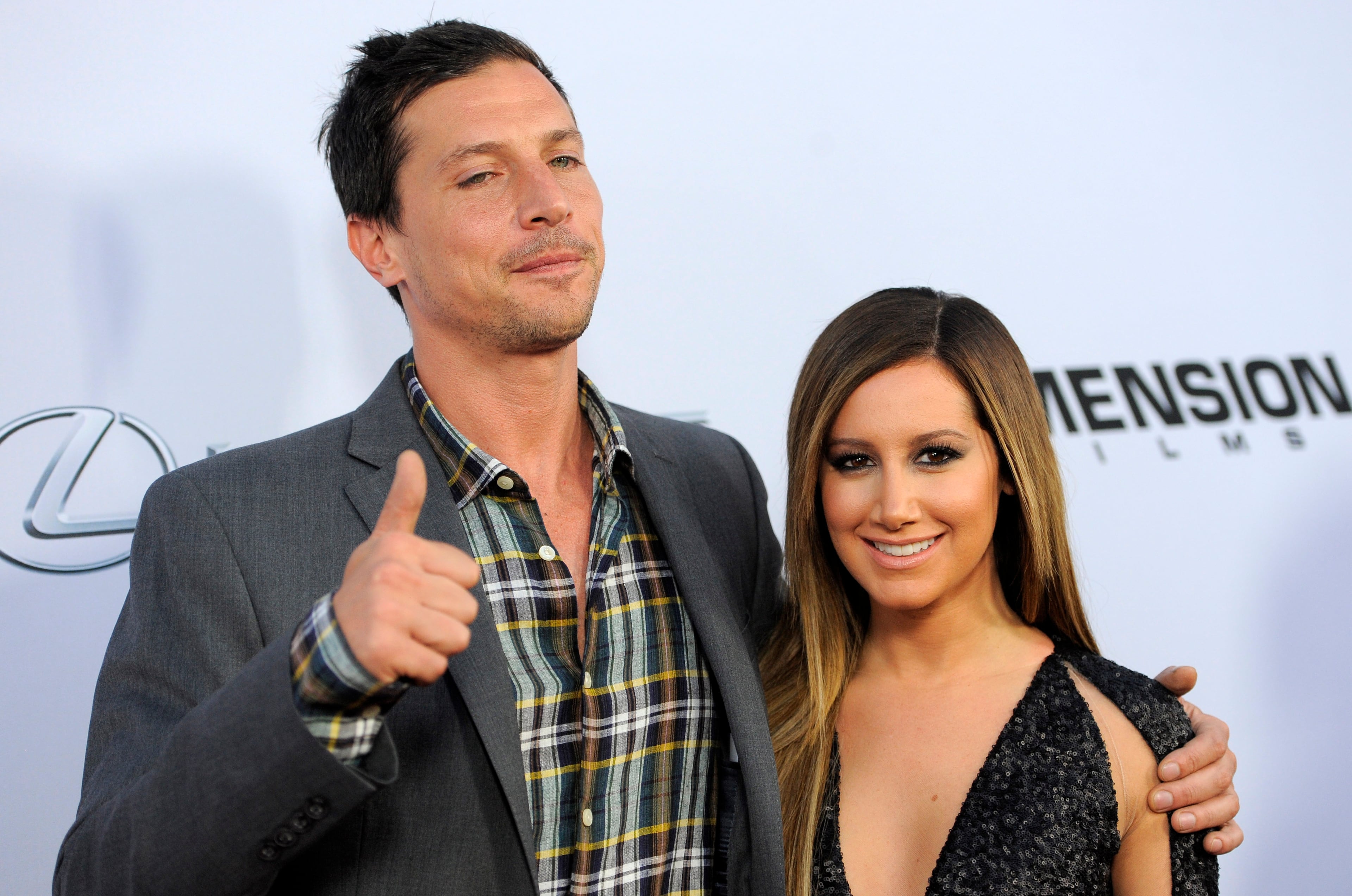 Simon Rex, left, and Ashley Tisdale, cast members in "Scary Movie V," pose together at the Los Angeles premiere of the film at the Cinerama Dome on Thursday, April 11, 2013 in Los Angeles.