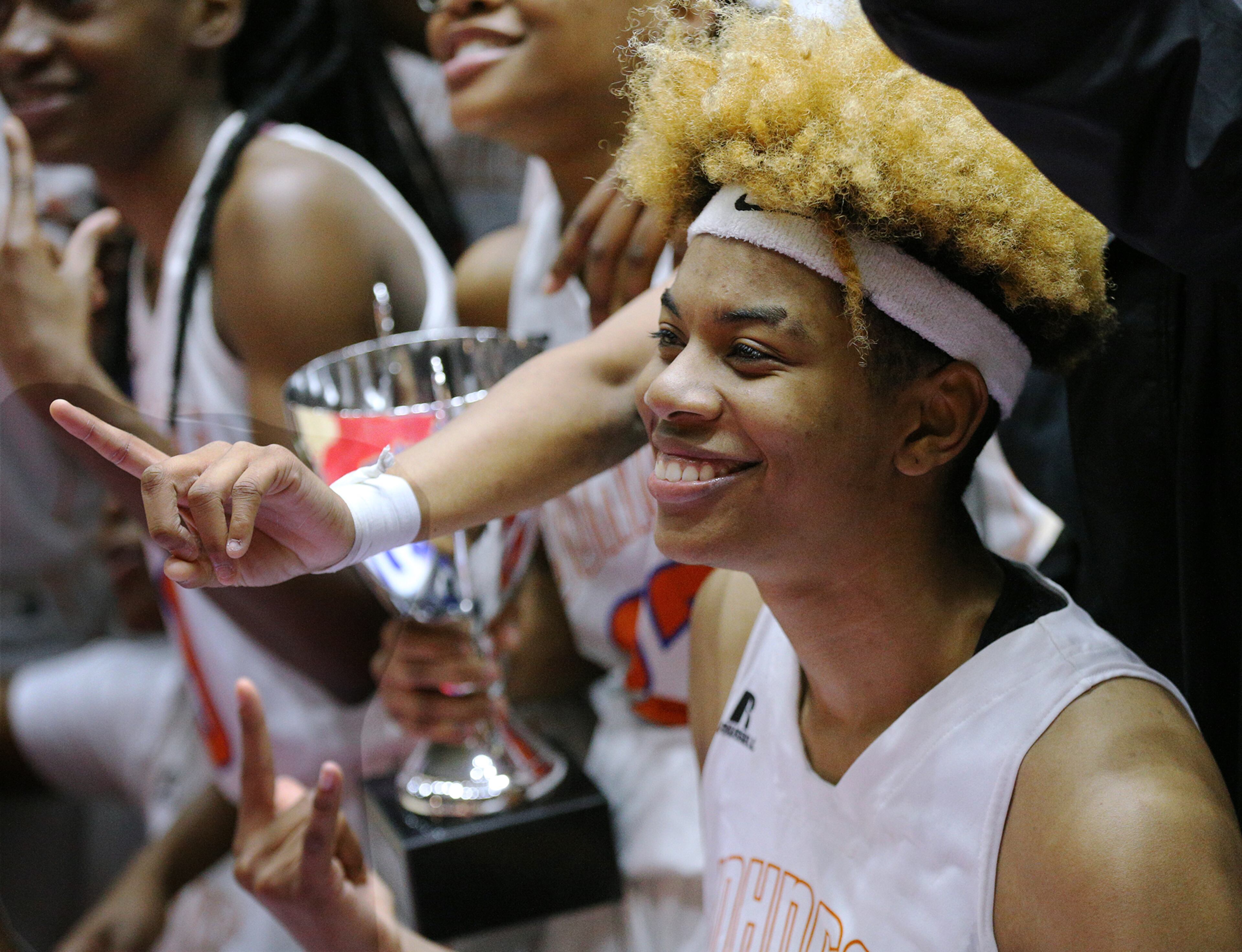 March 8, 2018 Macon: Johnson-Savannah center Giana Copeland and teammates celebrate a 62-50 victory over GAC in their GHSA state basketball championship game on Thursday, March 8, 2018, in Macon. Curtis Compton/ccompton@ajc.com