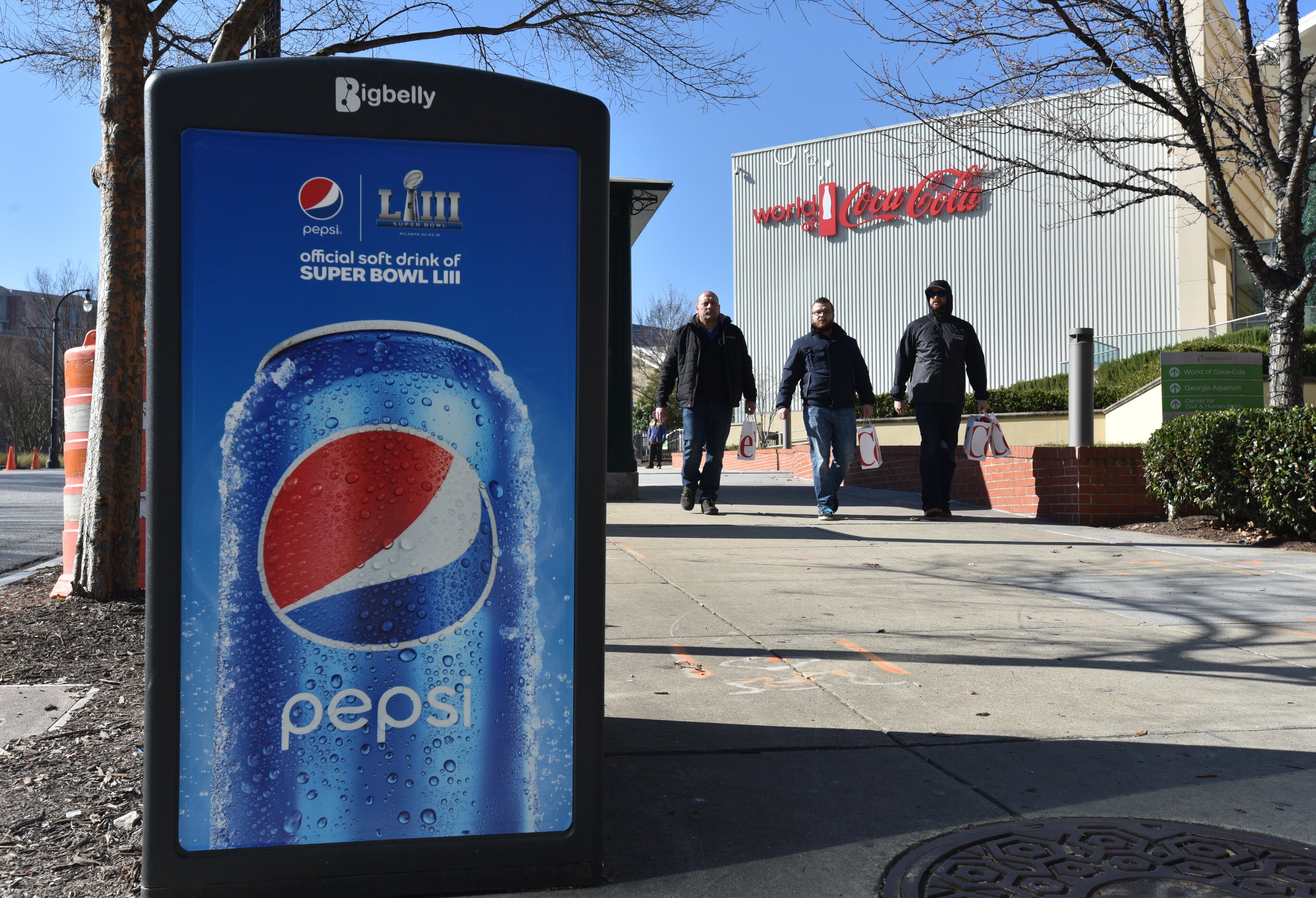 Atlanta - A advertisement for Pepsi is wrapped around a trash can near World of Coca-Cola in Atlanta on Wednesday, January 16, 2019. Atlanta faces a test on Super Bowl Sunday and the question with less than a month to go before the big game is this: Is the city ready? The city budgeted some $10 million last year for police, fire and other items to assist with the big game.