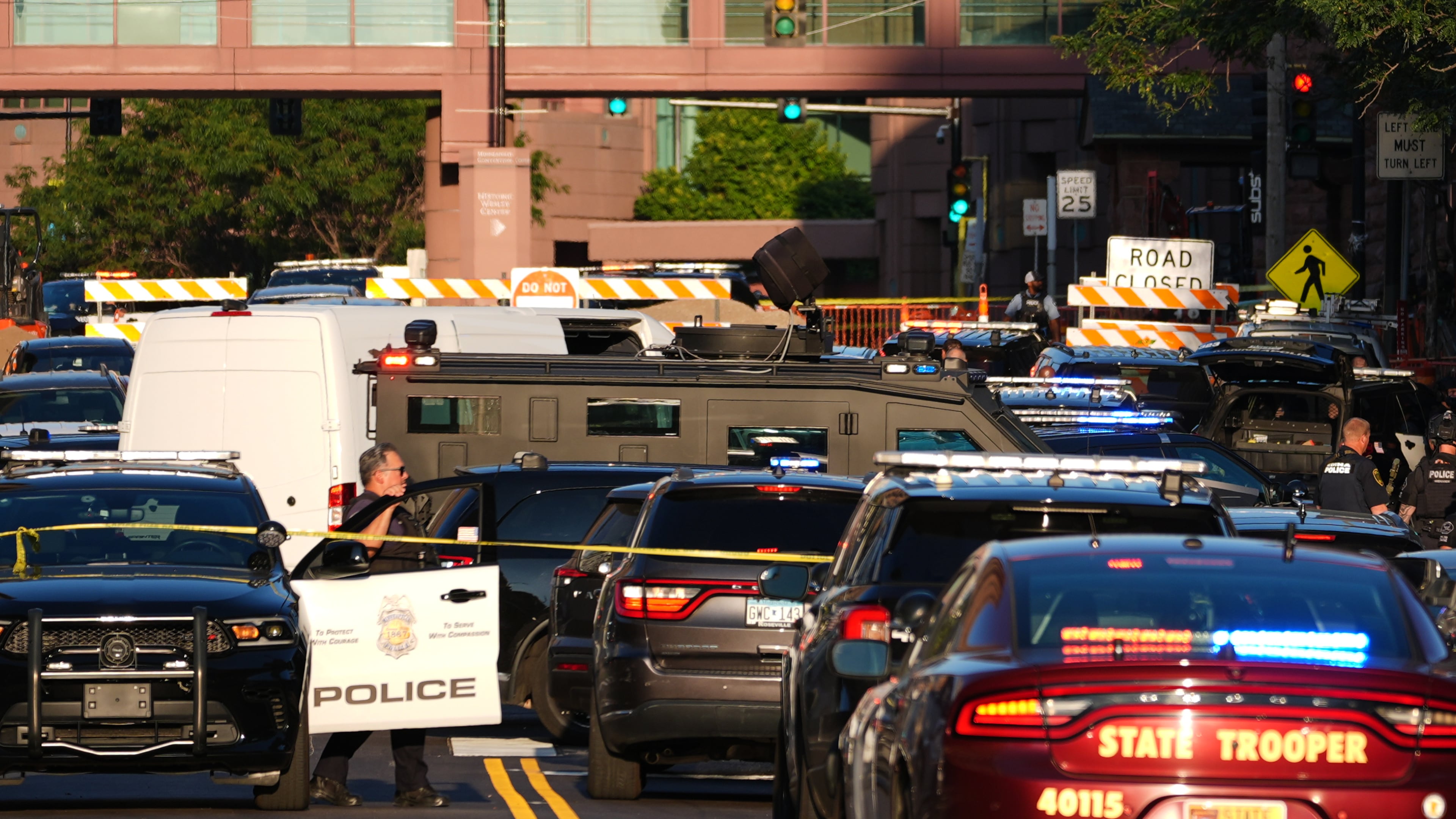 Law enforcement respond to a shooting Wednesday, Sept. 2, 2026, in downtown Minneapolis. (AP Photo/Ellen Schmidt)