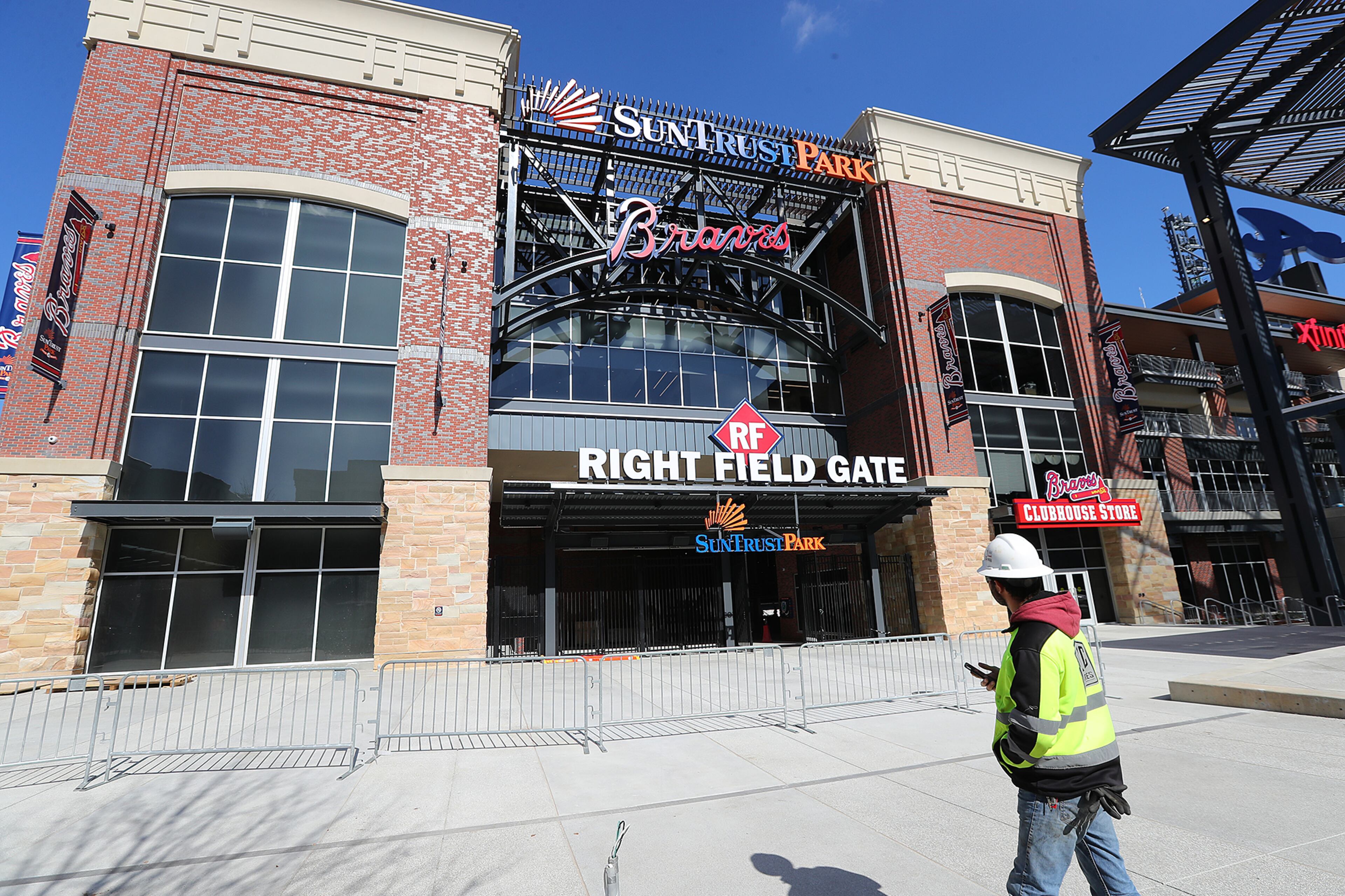 February 9, 2017, Atlanta: A construction worker snaps a photo of the right field gate as the Braves new stadium SunTrust Park takes shape on Thursday Feb. 9, 2017, in Atlanta. Curtis Compton/ccompton@ajc.com