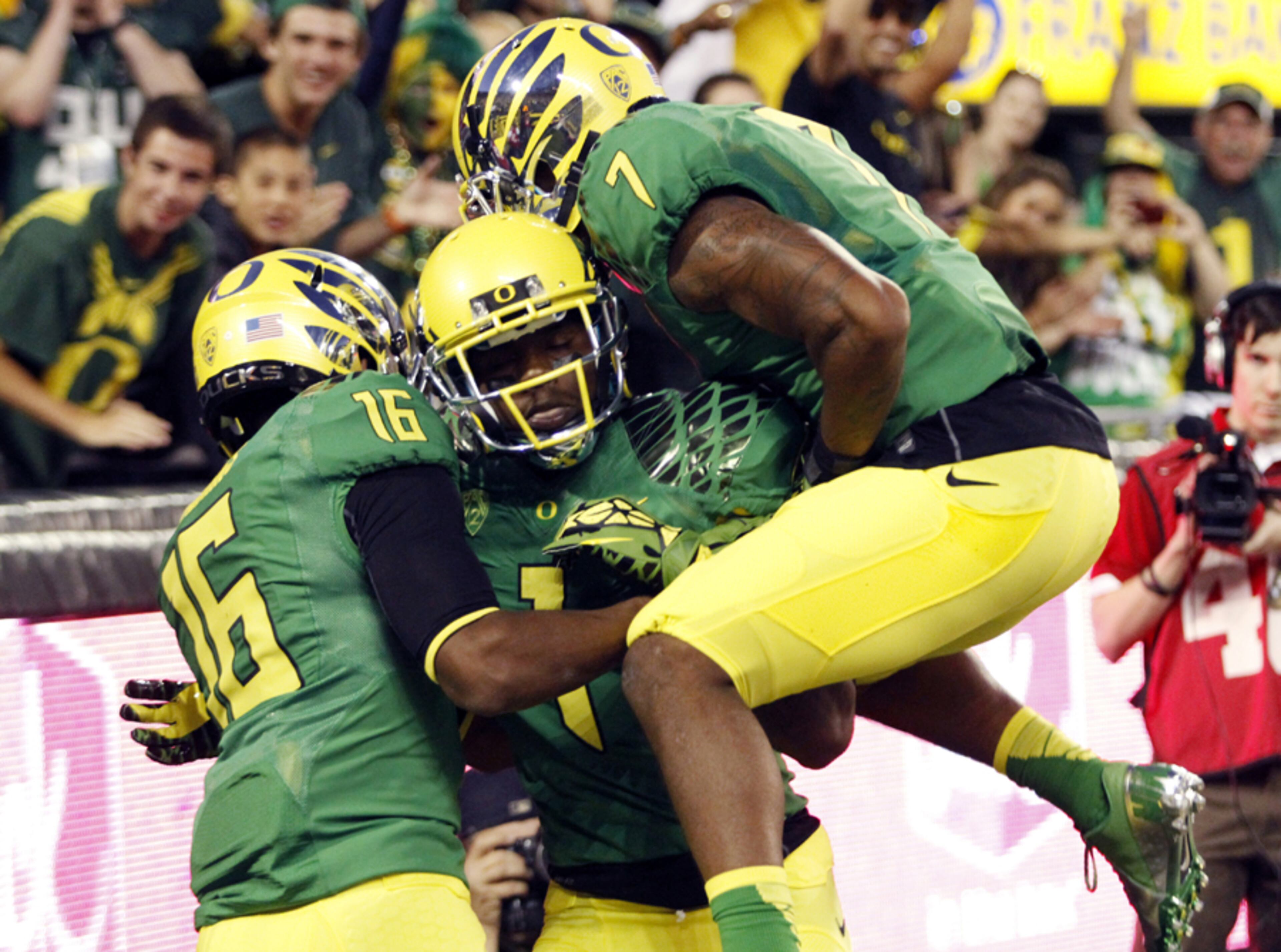 It wouldn't be a new season without a new radical look for Oregon. The Ducks were flashy in neon-like green and yellow uniforms that were topped off with a variant chrome helmet, featuring wings.