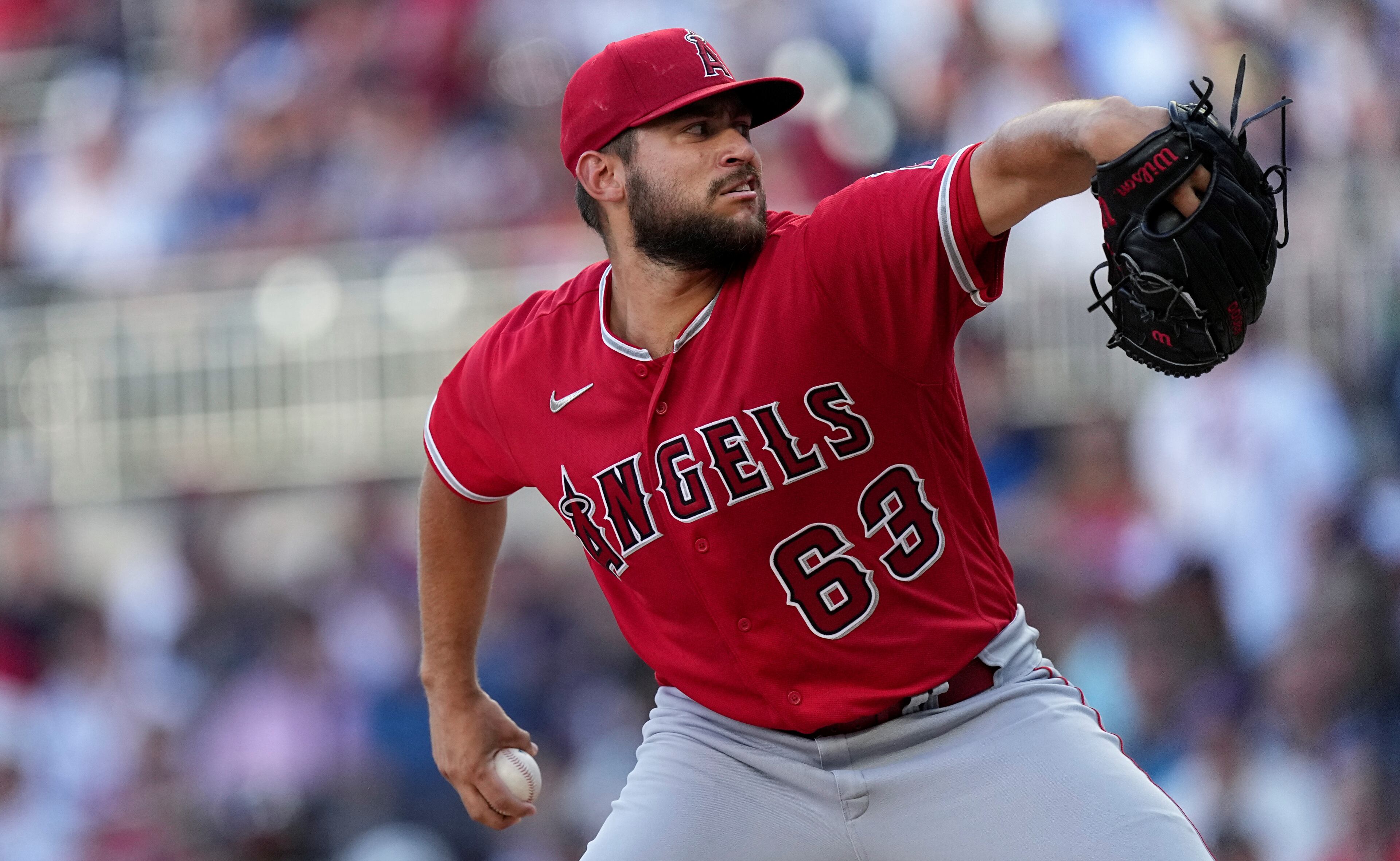 Los Angeles Angels starting pitcher Chase Silseth works against the Atlanta Braves in the first inning of a baseball game Monday, July 31, 2023, in Atlanta. (AP Photo/John Bazemore)