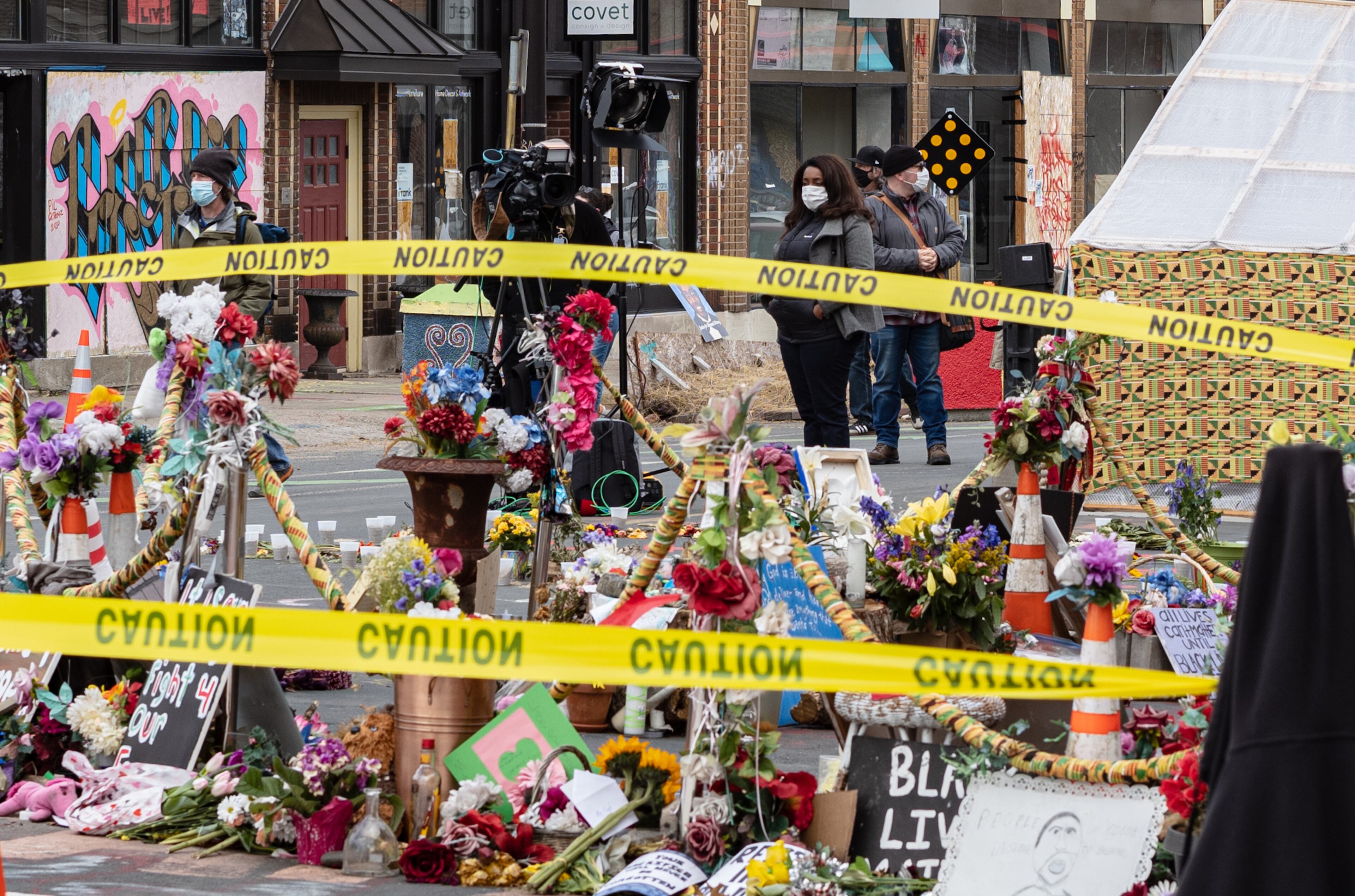 People visit the George Floyd memorial in Minneapolis on Tuesday, April 20, 2021, as the jury continues deliberations in the Derek Chauvin trial. Chauvin, a former police officer is charged in the death of George Floyd while in police custody last year. (Amr Alfiky/The New York Times)