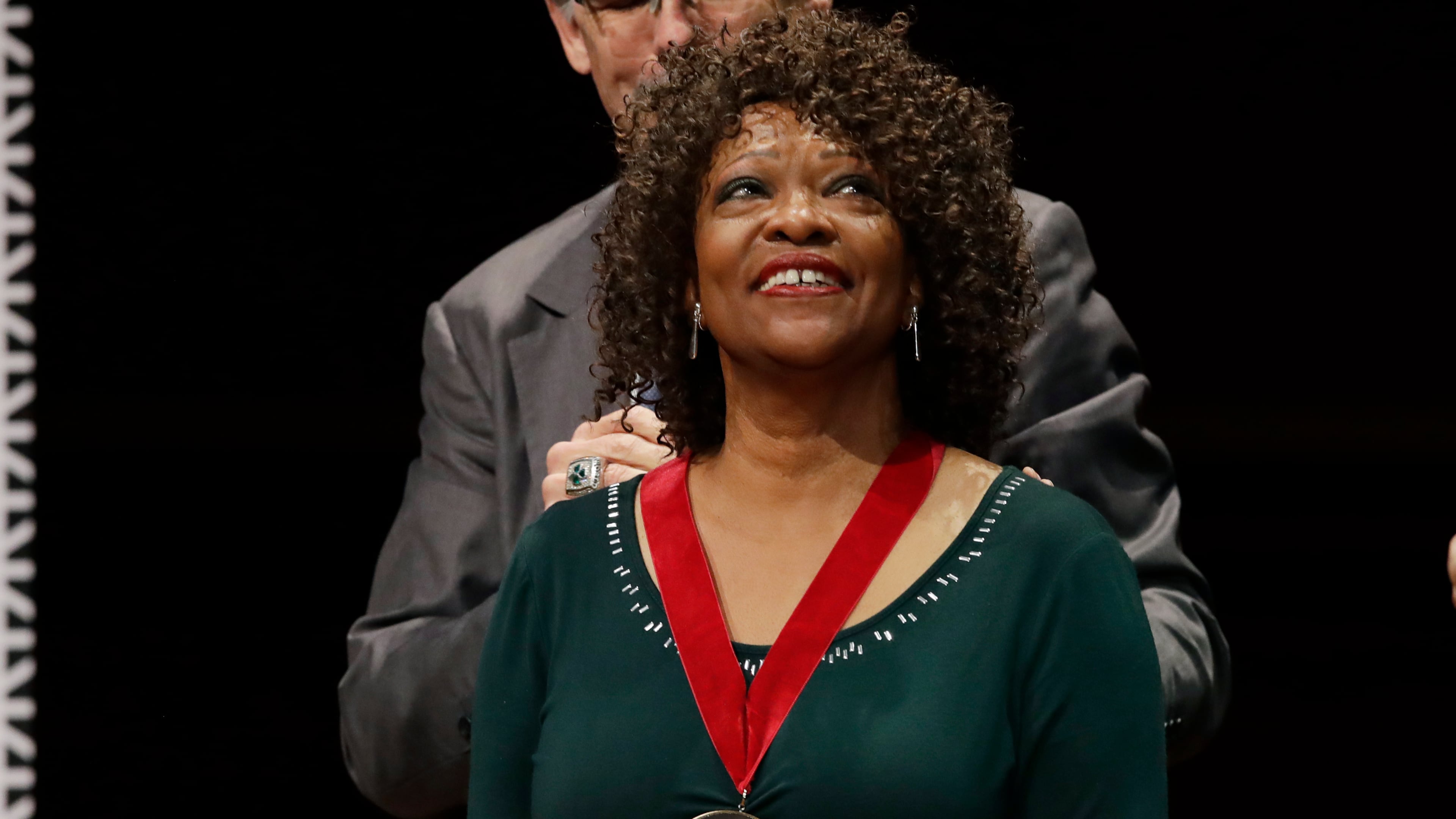 Poet Rita Dove receives the W.E.B. Dubois Medal for her contributions to black history and culture during ceremonies at Harvard University, Tuesday, Oct. 22, 2019, in Cambridge, Massachusetts. (AP Photo/Elise Amendola)