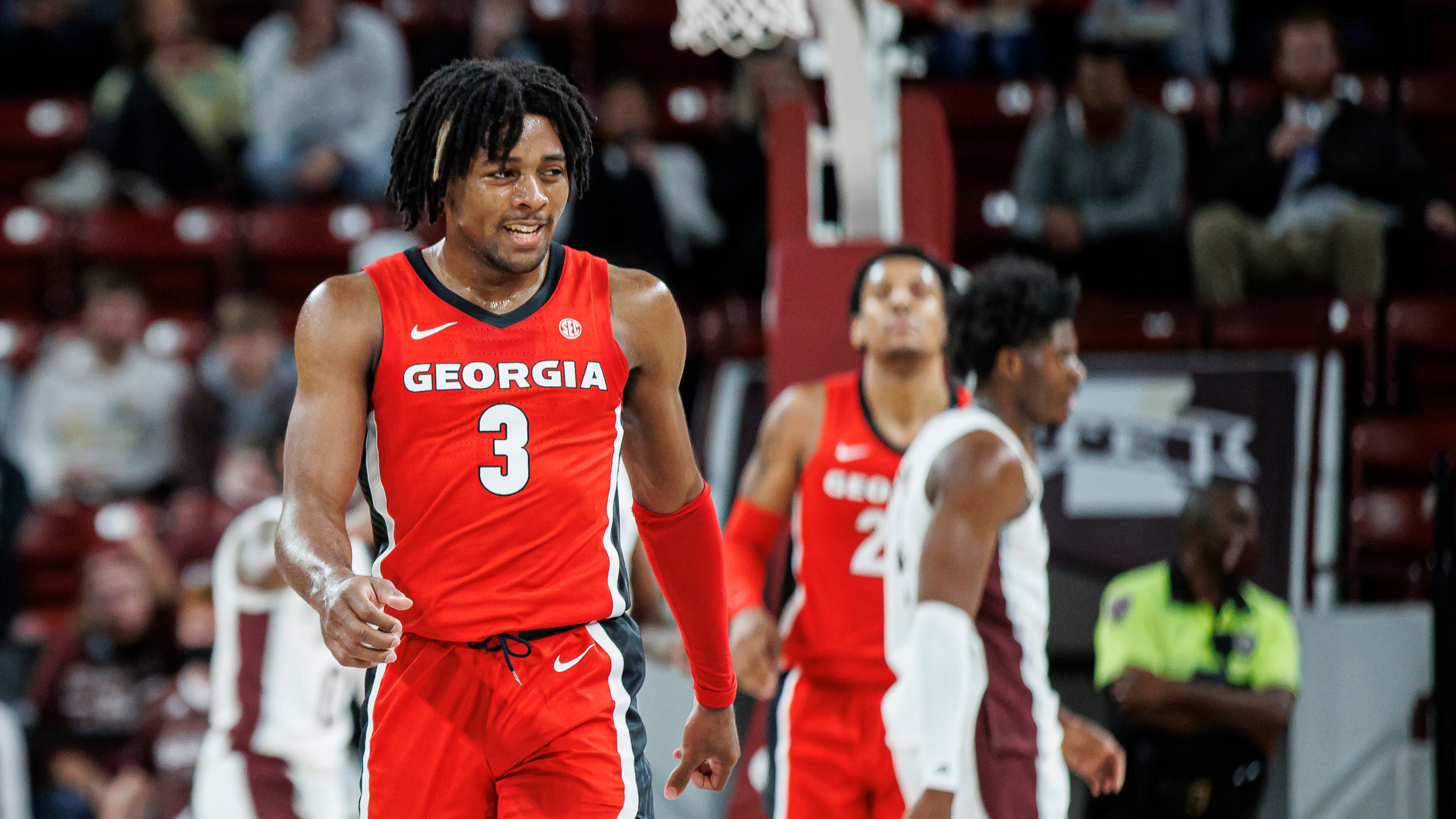 STARKVILLE, MS - January 12, 2022 - Kario Oquendo (3) of the Georgia Bulldogs offers a smile during Wednesday's against Mississippi State at Humphrey Coliseum in Starkville, Miss. (Photo By Austin Perryman for UGA Athletics)