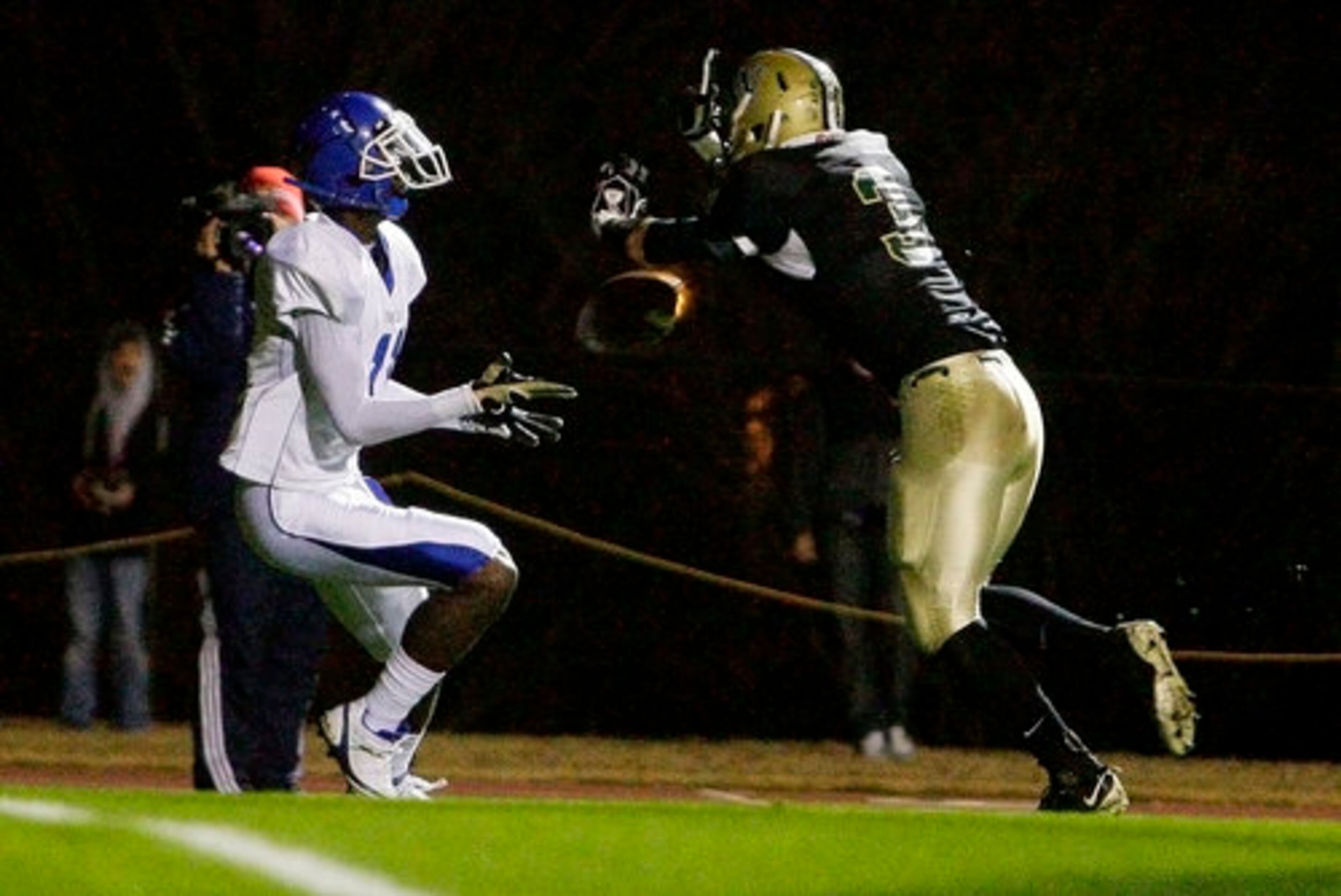 Wilcox County's Jackson Milton (11) catches a touchdown while being defended by Wesleyan's Harrison Cheeley (3) during the first half. Category: