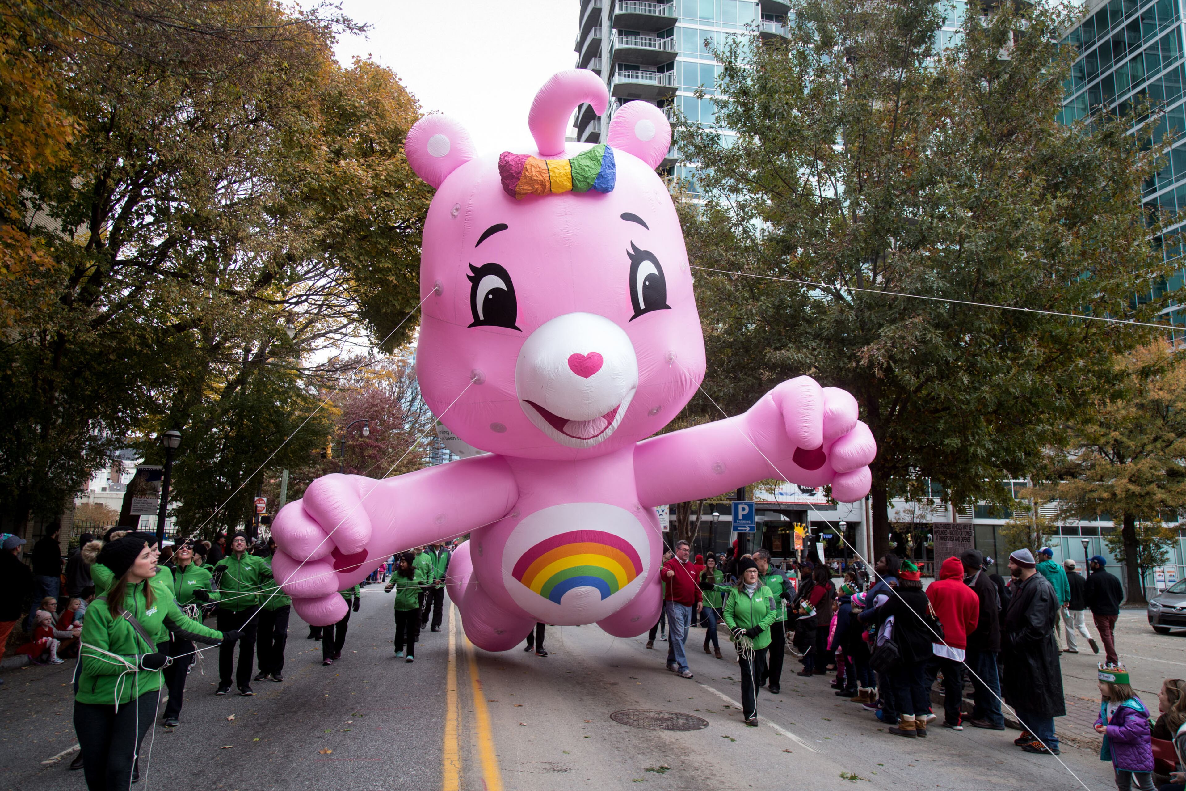 A Care Bear float makes its way up Peachtree Street during the Children's Christmas Parade Saturday, December 03, 2016, in Atlanta. GA. STEVE SCHAEFER / SPECIAL TO THE AJC