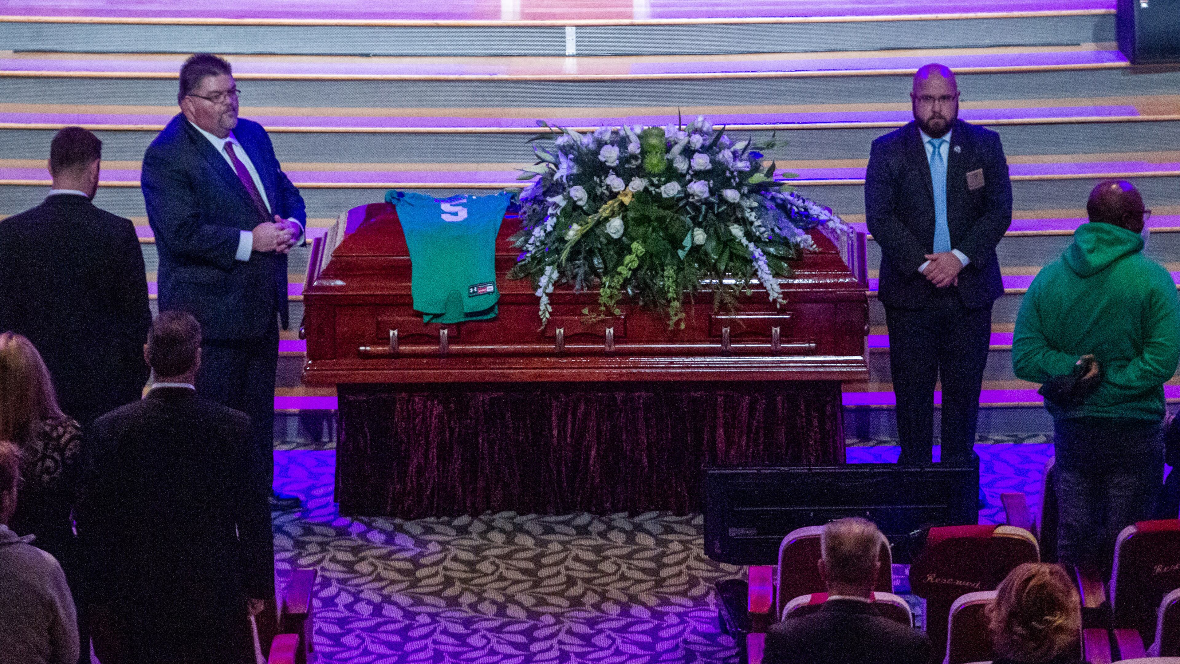The coffin of Roswell High School football player Robbie Roper is moved into the church before the start of his funeral service at the First Baptist Church of Woodstock on Tuesday, Dec. 28, 2021. STEVE SCHAEFER FOR THE ATLANTA JOURNAL-CONSTITUTION