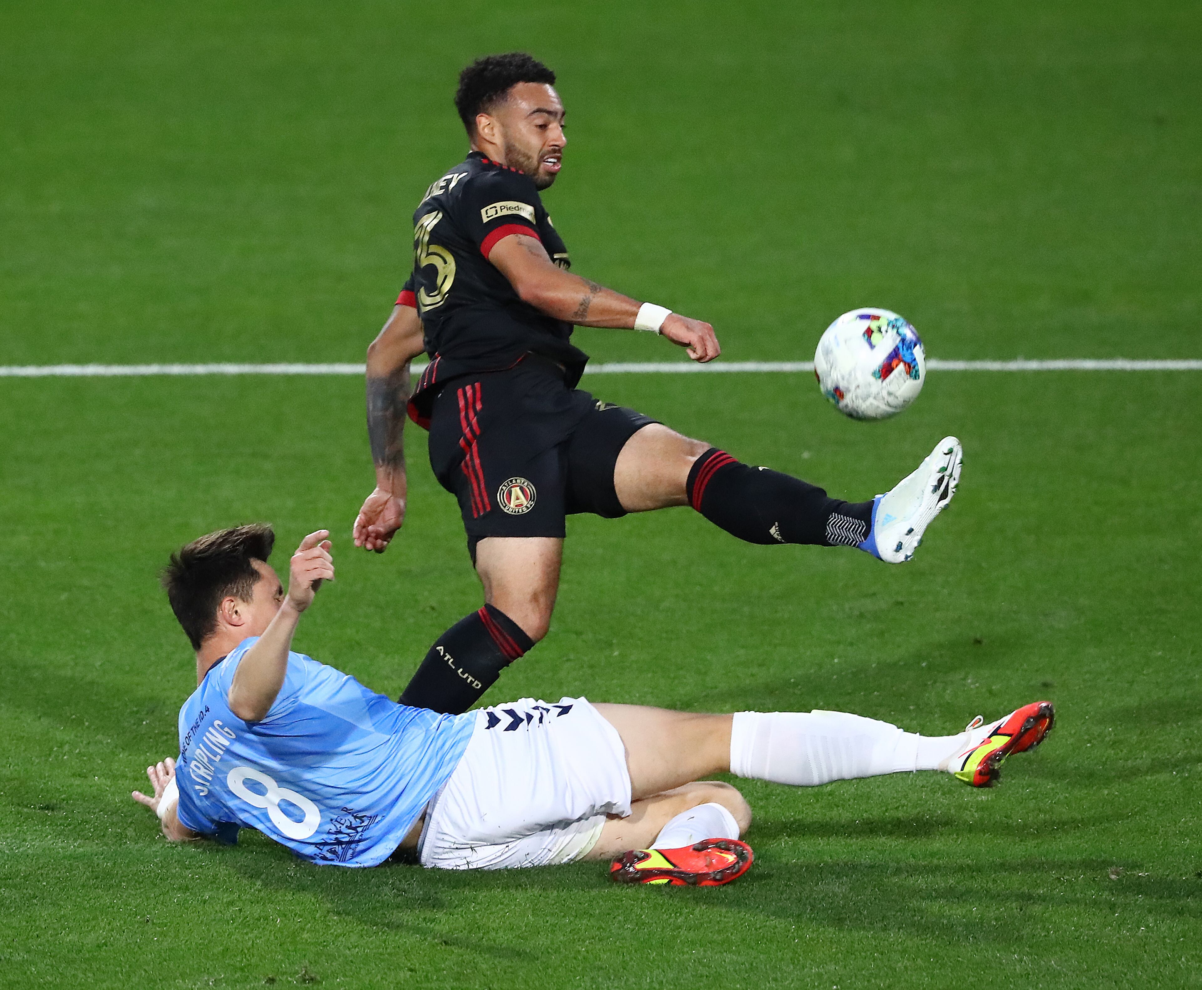 Atlanta United midfielder Jake Mulraney works the ball past Chattanooga FC defender Colin Stripling setting up a shot on goal in the Lamar Hunt U.S. Open Cup on Wednesday, April 20, 2022, in Kennesaw. Atlanta United won the match 6-0. “Curtis Compton / Curtis.Compton@ajc.com”