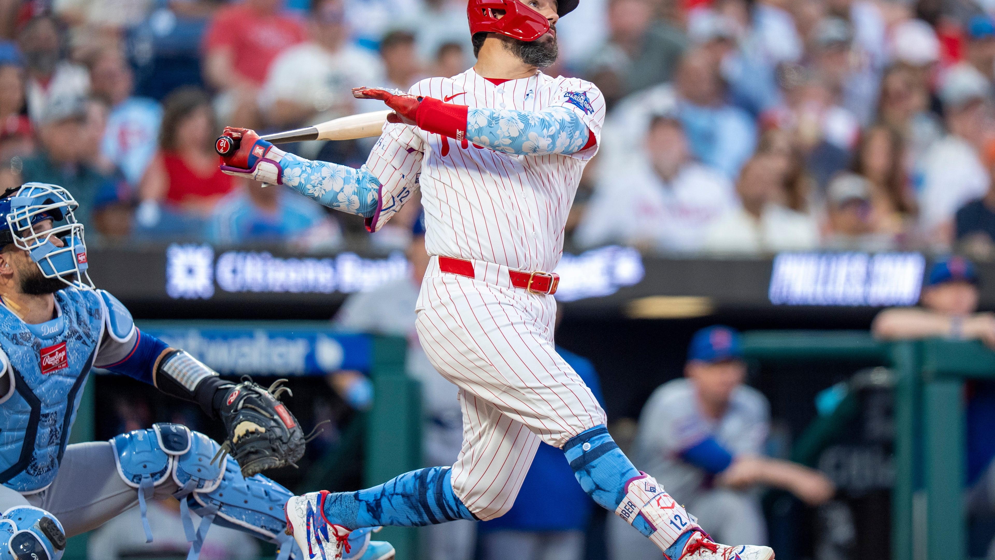 Philadelphia Phillies' Kyle Schwarber, right, hits a three-run home run during the second inning of a baseball game against the New York Mets, Sunday, June 21, 2026, in Philadelphia. (AP Photo/Chris Szagola)