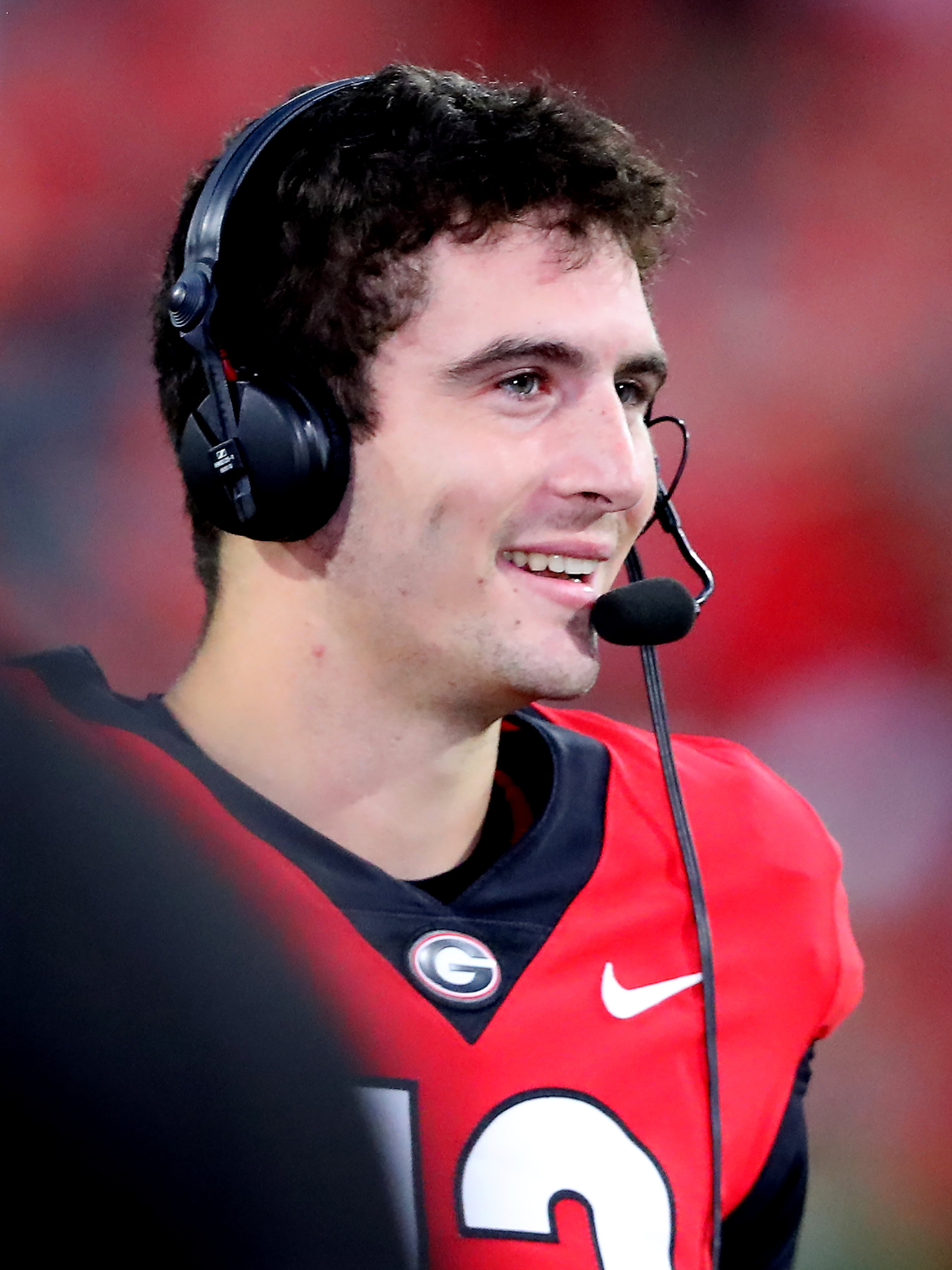 Georgia quarterback Stetson Bennett is all smiles during an interview following a 30-13 victory over Kentucky in a NCAA college football game on Saturday, Oct. 16, 2021, in Athens. “Curtis Compton / Curtis.Compton@ajc.com”
