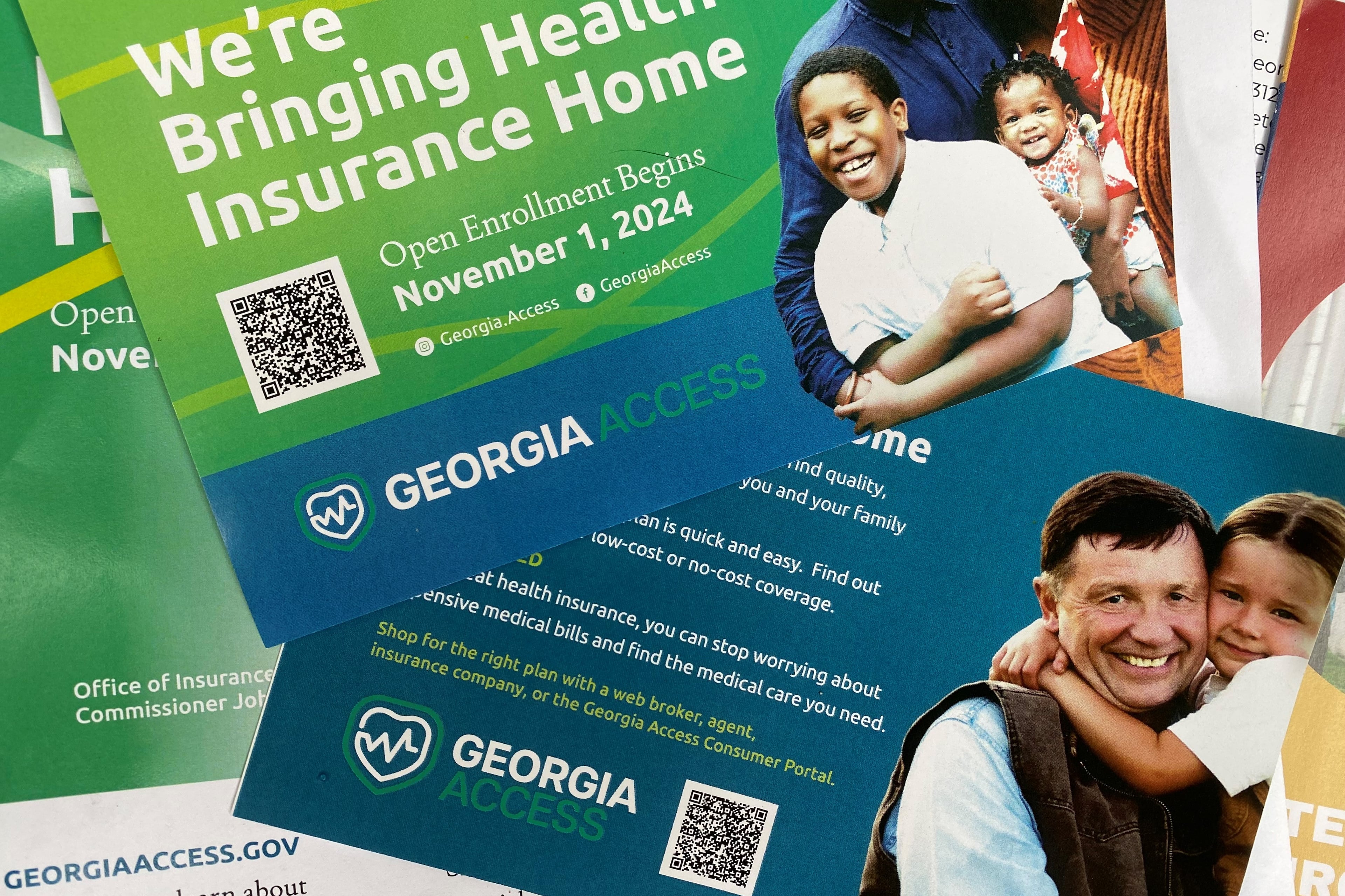 Promotional materials for Georgia Access, the state's exchange marketplace for the Affordable Care Act, distributed at a launch event in November 2024. (Ariel Hart/AJC 2024)