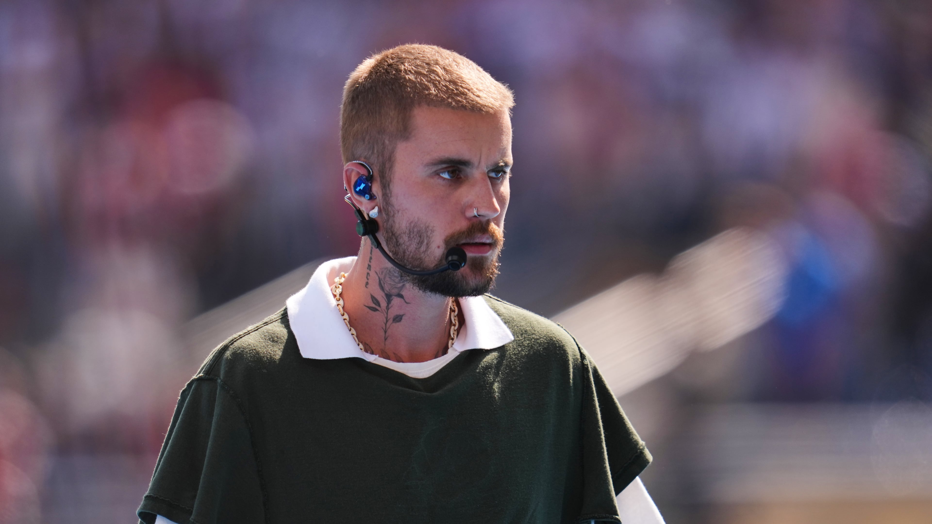 Justin Bieber leaves the pitch after performing at halftime during the World Cup final soccer match between Spain and Argentina in East Rutherford, N.J., near New York, Sunday, July 19, 2026. (AP Photo/Abbie Parr)