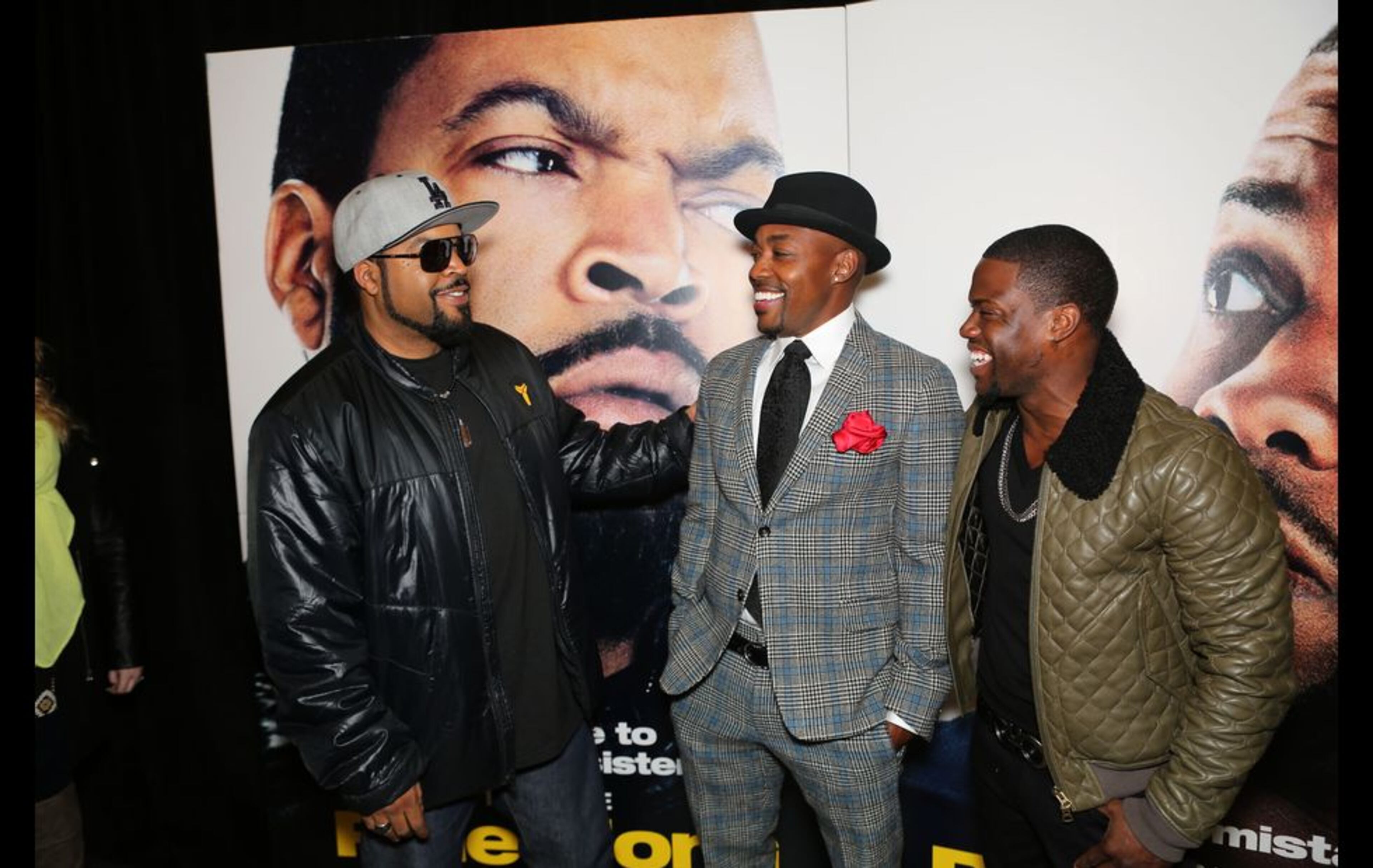 Ice Cube, left, and Kevin Hart, right, pose on the red carpet for the premier of comedy action film "Ride Along," at the Atlantic Station Regal Theater in Atlanta Monday, Jan. 6, 2014. Photo: Akili-Casundria Ramsess for the AJC