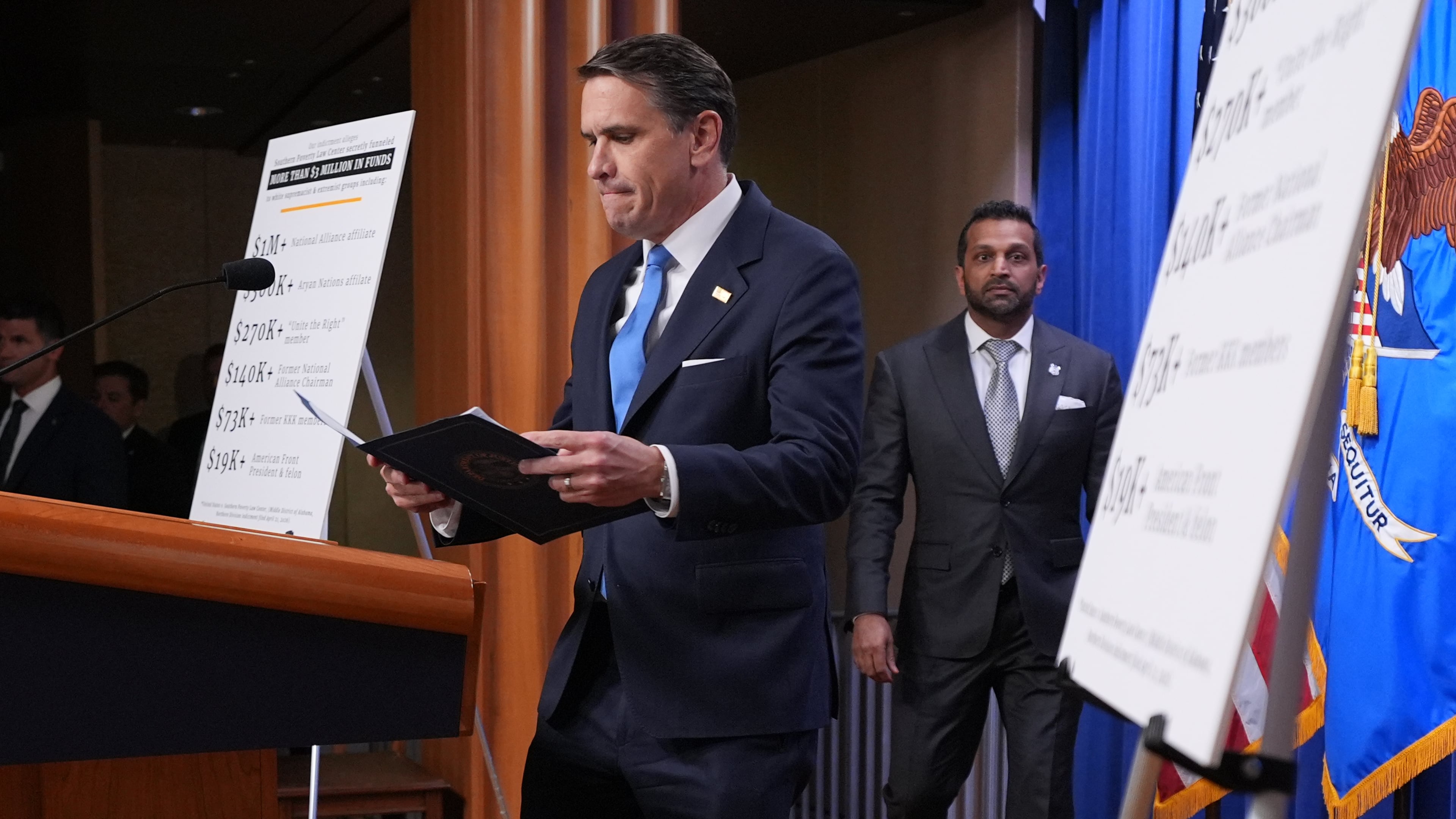 Acting Attorney General Todd Blanche and FBI Director Kash Patel arrive for a news conference at the Justice Department, Tuesday, April 21, 2026, in Washington. (AP Photo/Jacquelyn Martin)