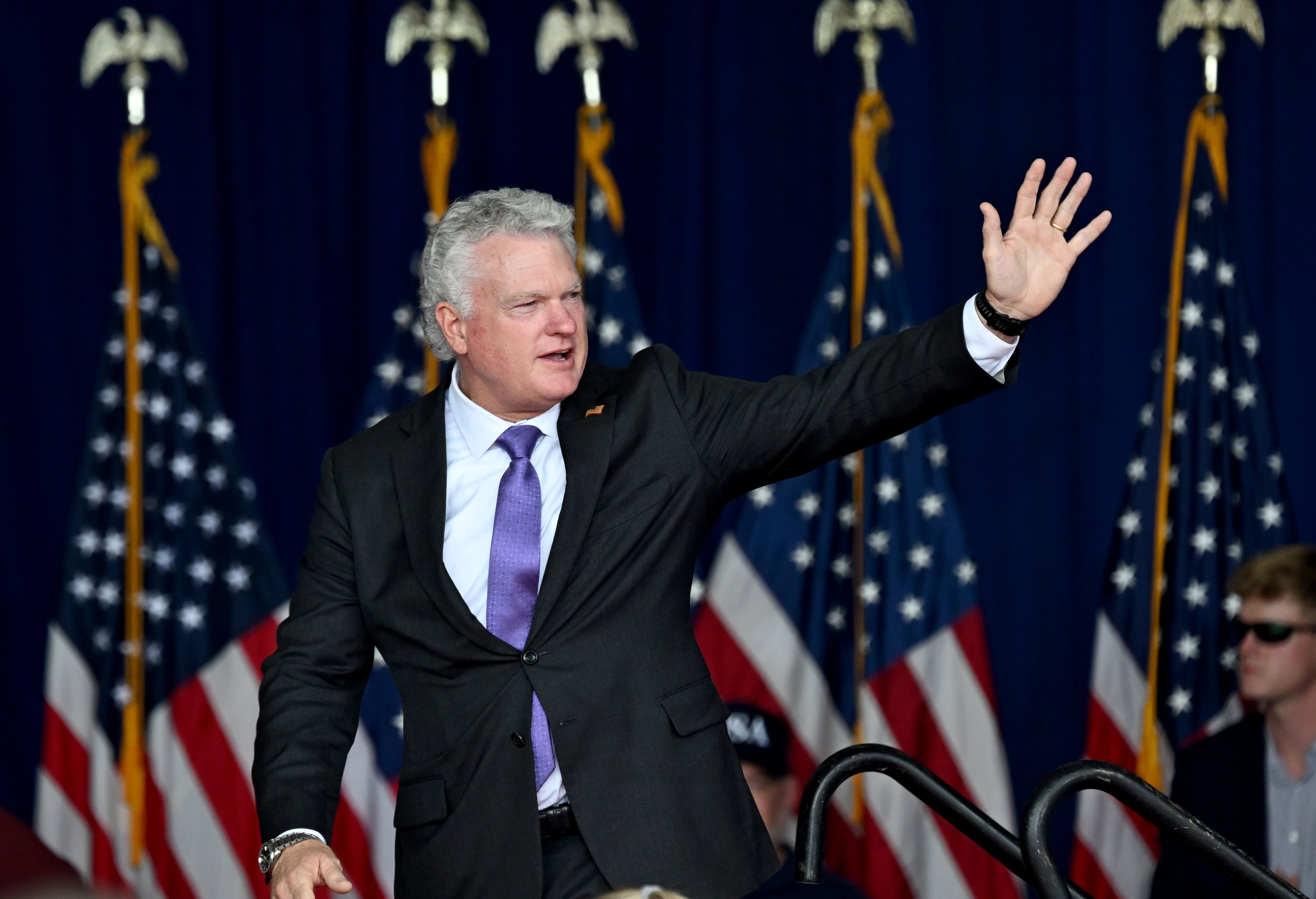 U.S. Rep. Mike Collins takes the stage to speak during a campaign rally at Dalton Municipal Airport on Friday, Oct. 16, 2026, in Dalton. (Hyosub Shin/AJC)