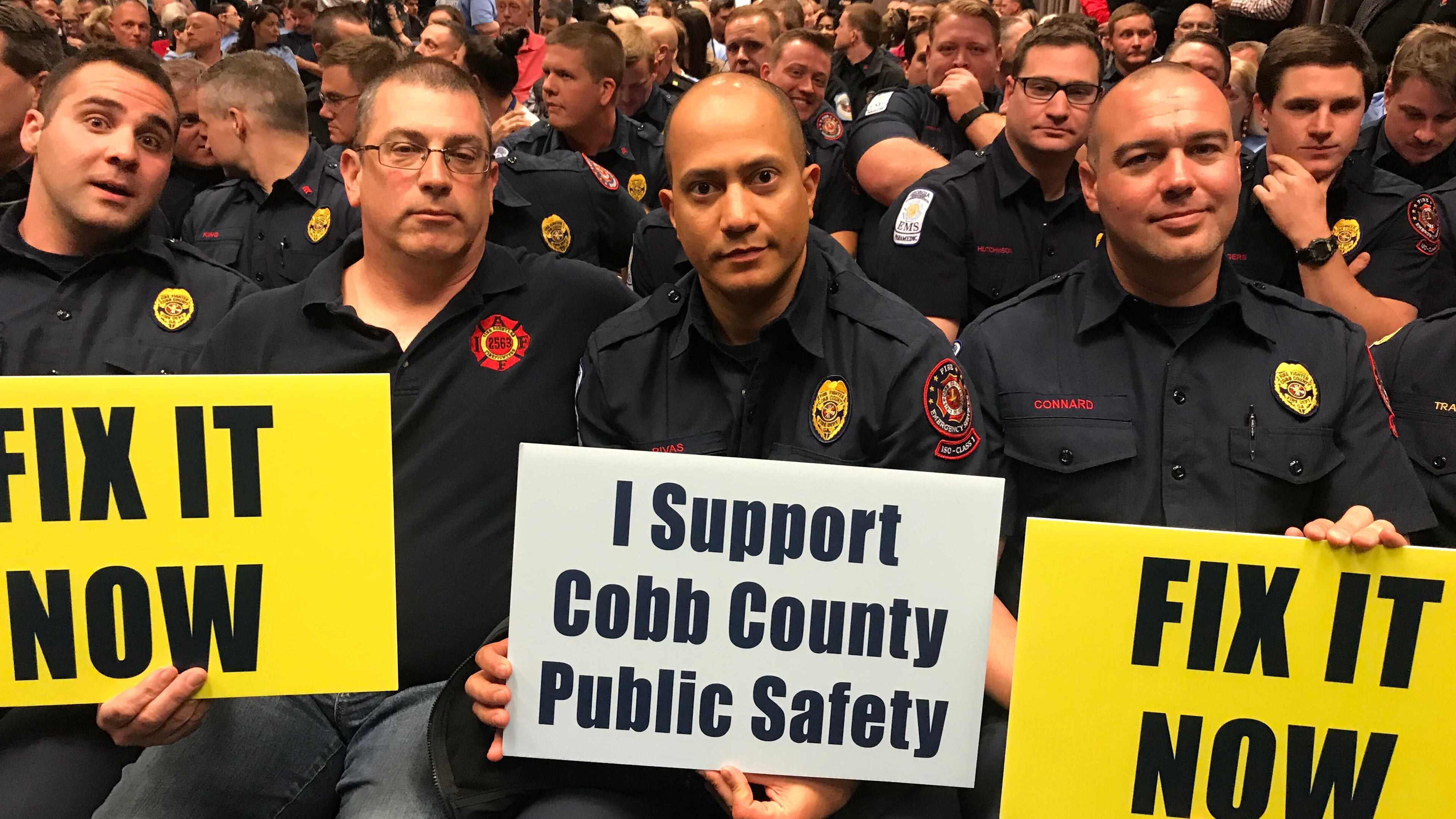 Cobb public safety employees urged the BOC to increase pay and benefits (Meris Lutz/AJC)