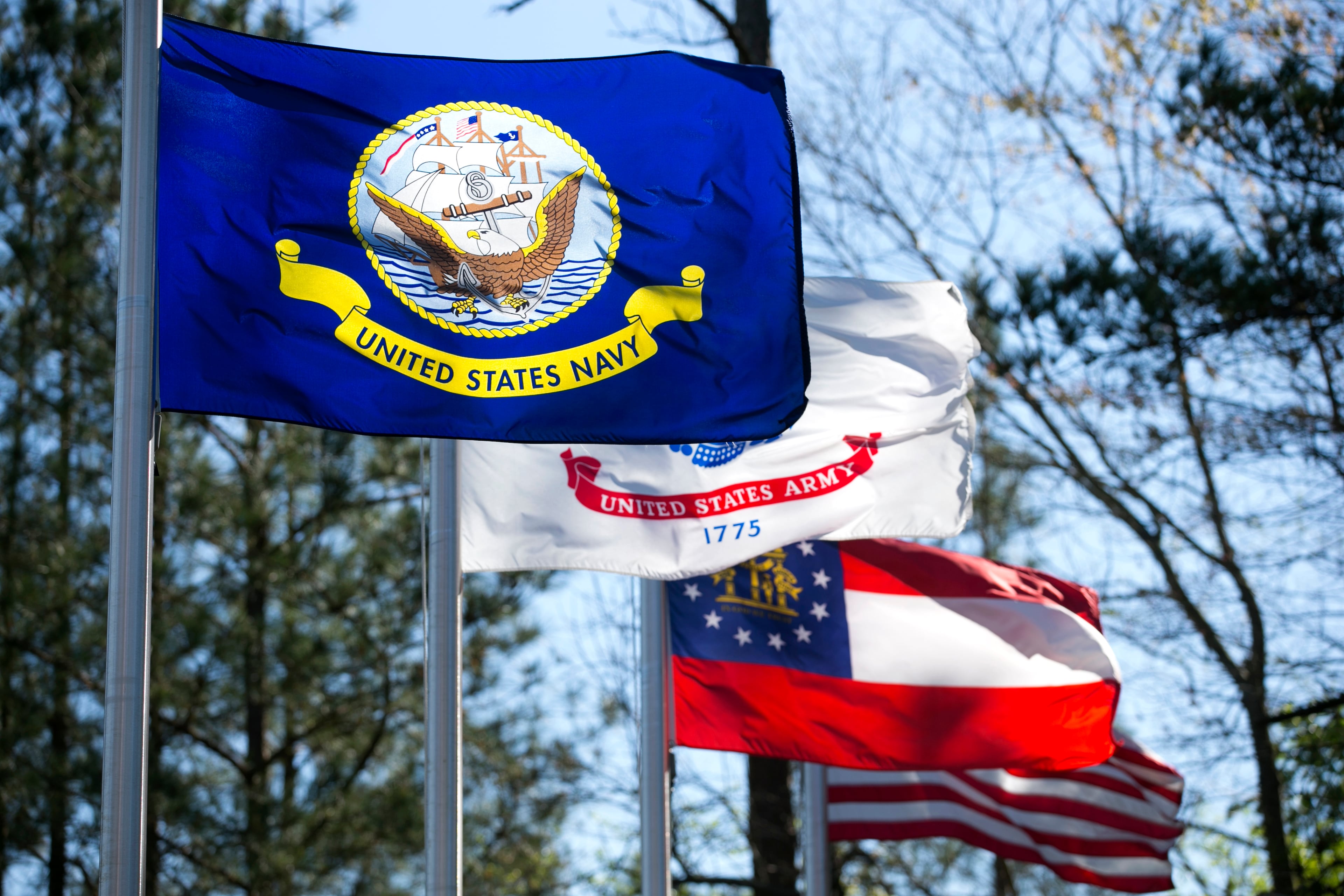 April 2, 2016 - Johns Creek, Ga: The U.S. Navy flag and others fly at the Veteran's Memorial Park at Newtown Park Saturday, April 2, 2016, in Johns Creek, Ga. This is for the insider's guide feature about the Newtown neighborhood. PHOTO / JASON GETZ