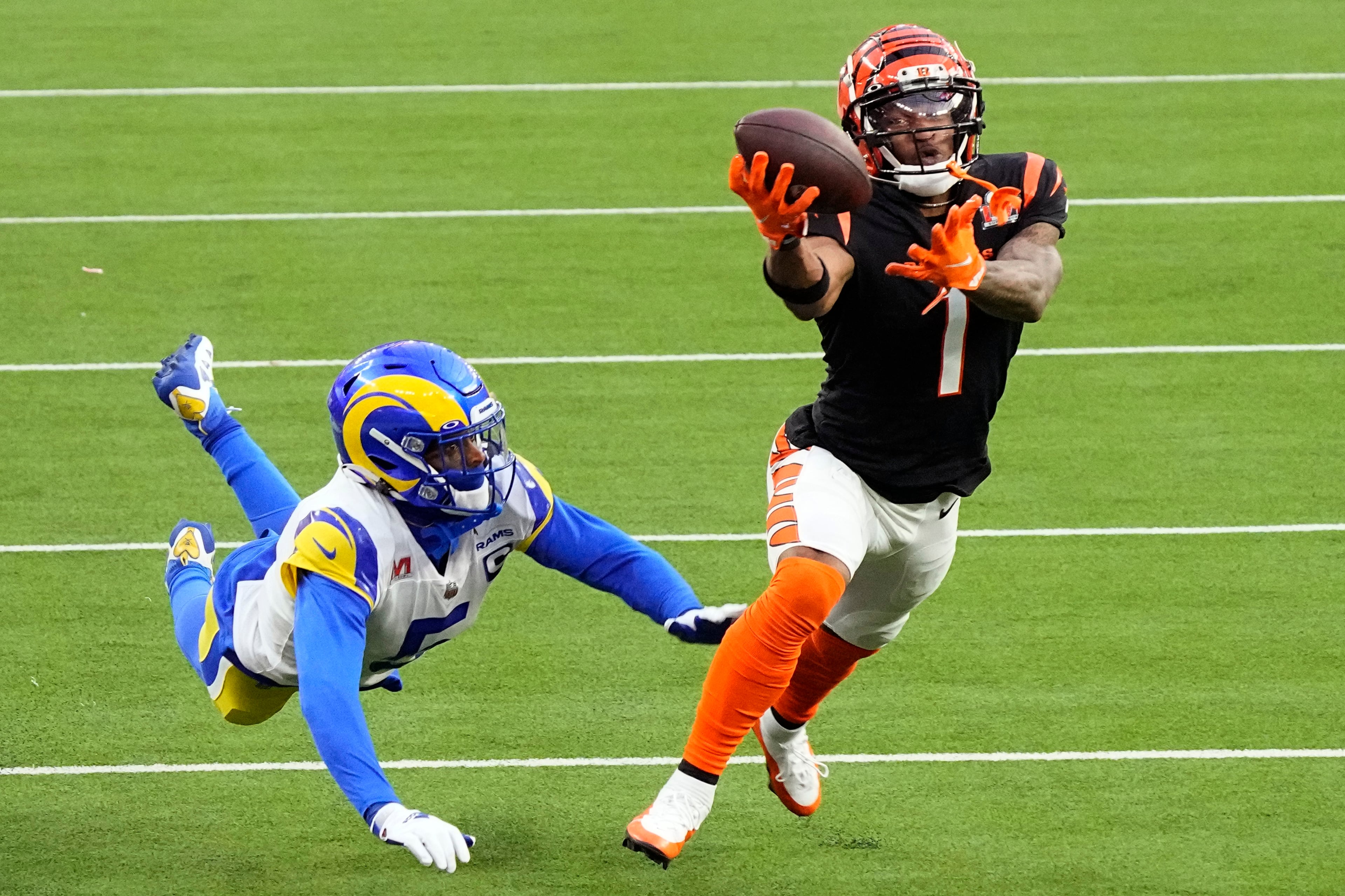 Los Angeles Rams quarterback Matthew Stafford (9) passes against the Cincinnati Bengals during the first half of the NFL Super Bowl 56 football game Sunday, Feb. 13, 2022, in Inglewood, Calif. (AP Photo/Marcio Jose Sanchez)