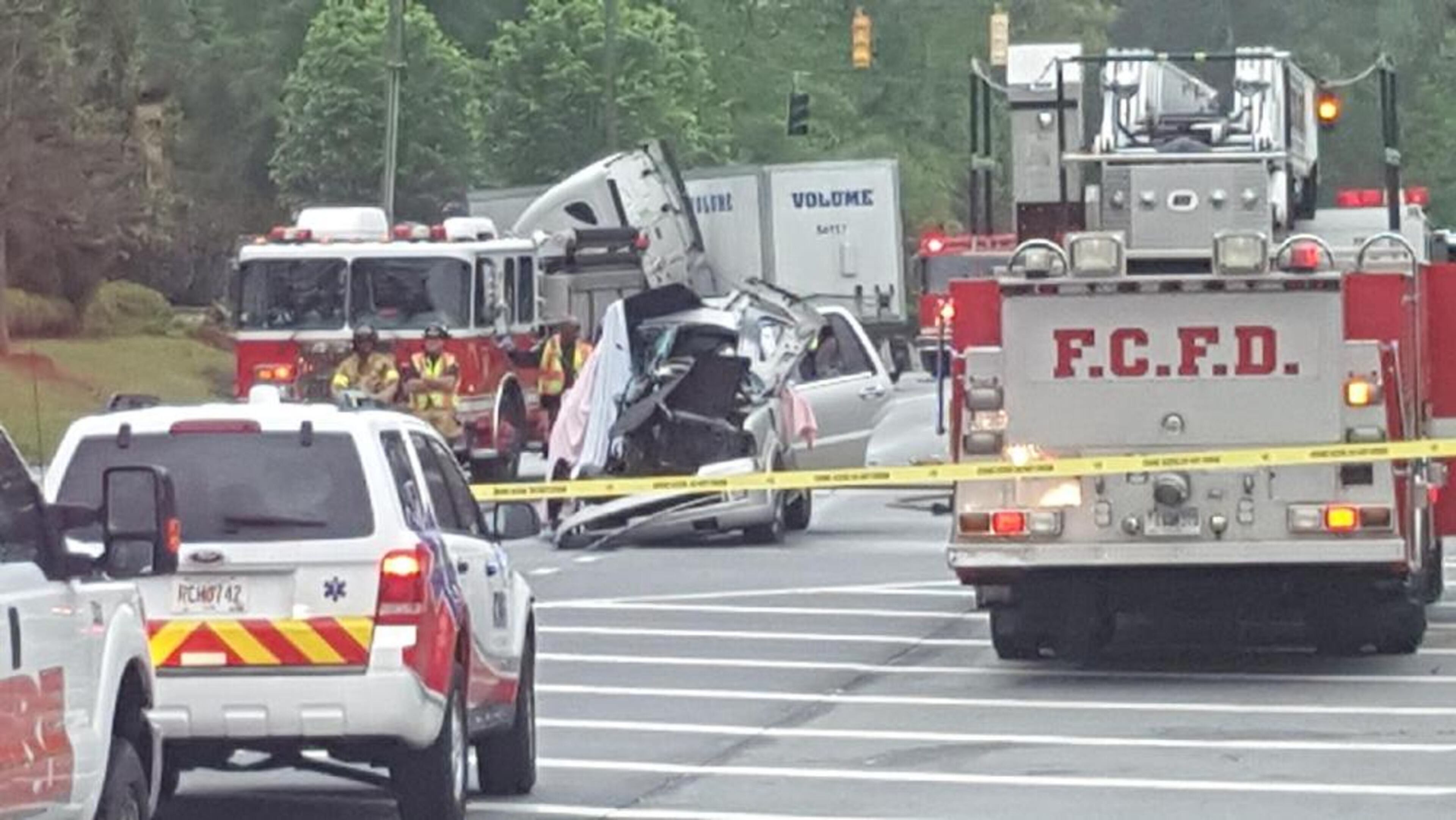 Four people are dead after a crash Monday April 24, 2017, between a tractor-trailer and a Lincoln Navigator, Fulton County police said. (Credit: Channel 2 Action News)