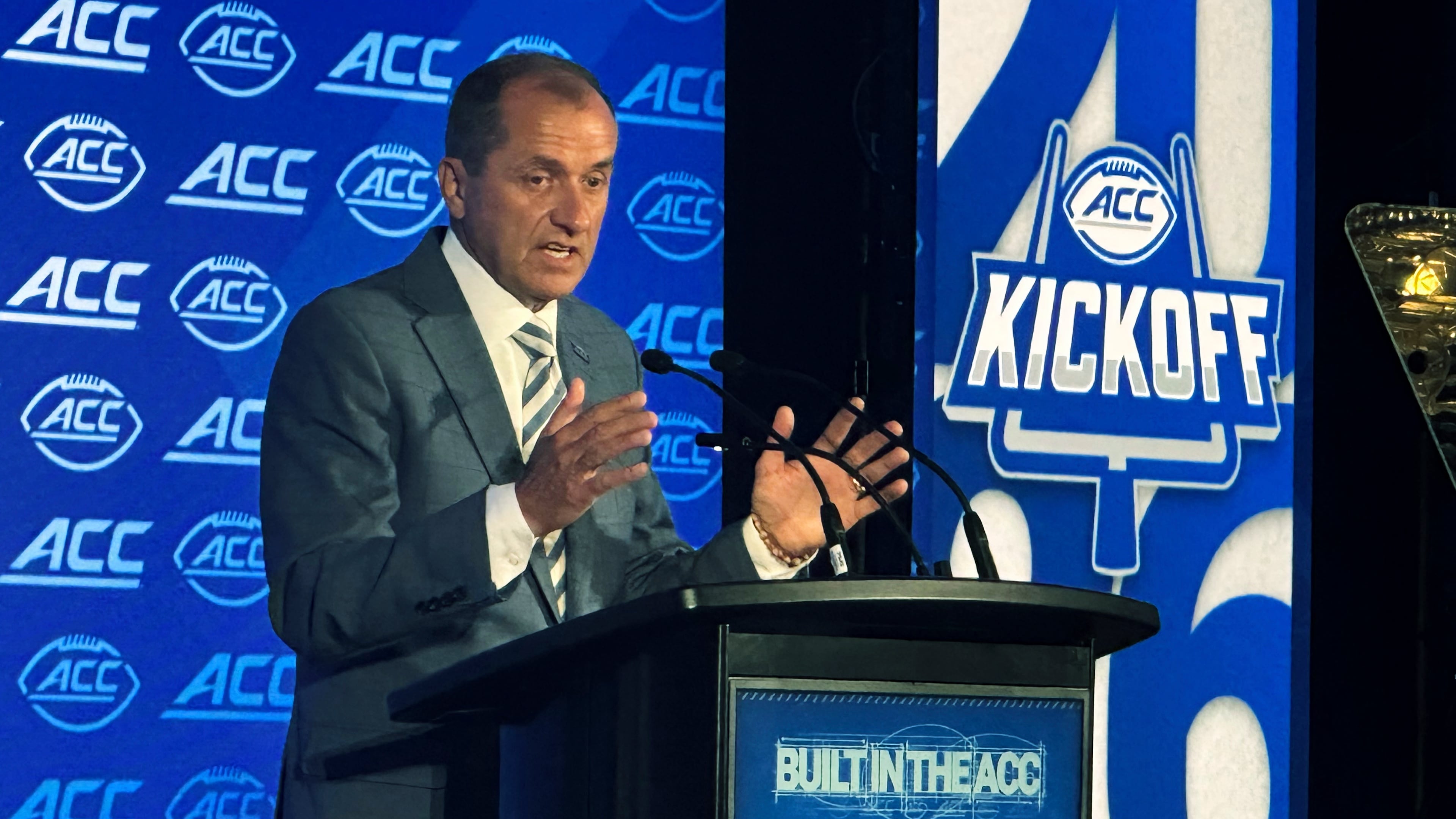 ACC commissioner Jim Phillips speaks during ACC Kickoff preseason football media days, Wednesday, July 15, 2026 in Charlotte, N.C. (AP Photo/Aaron Beard)