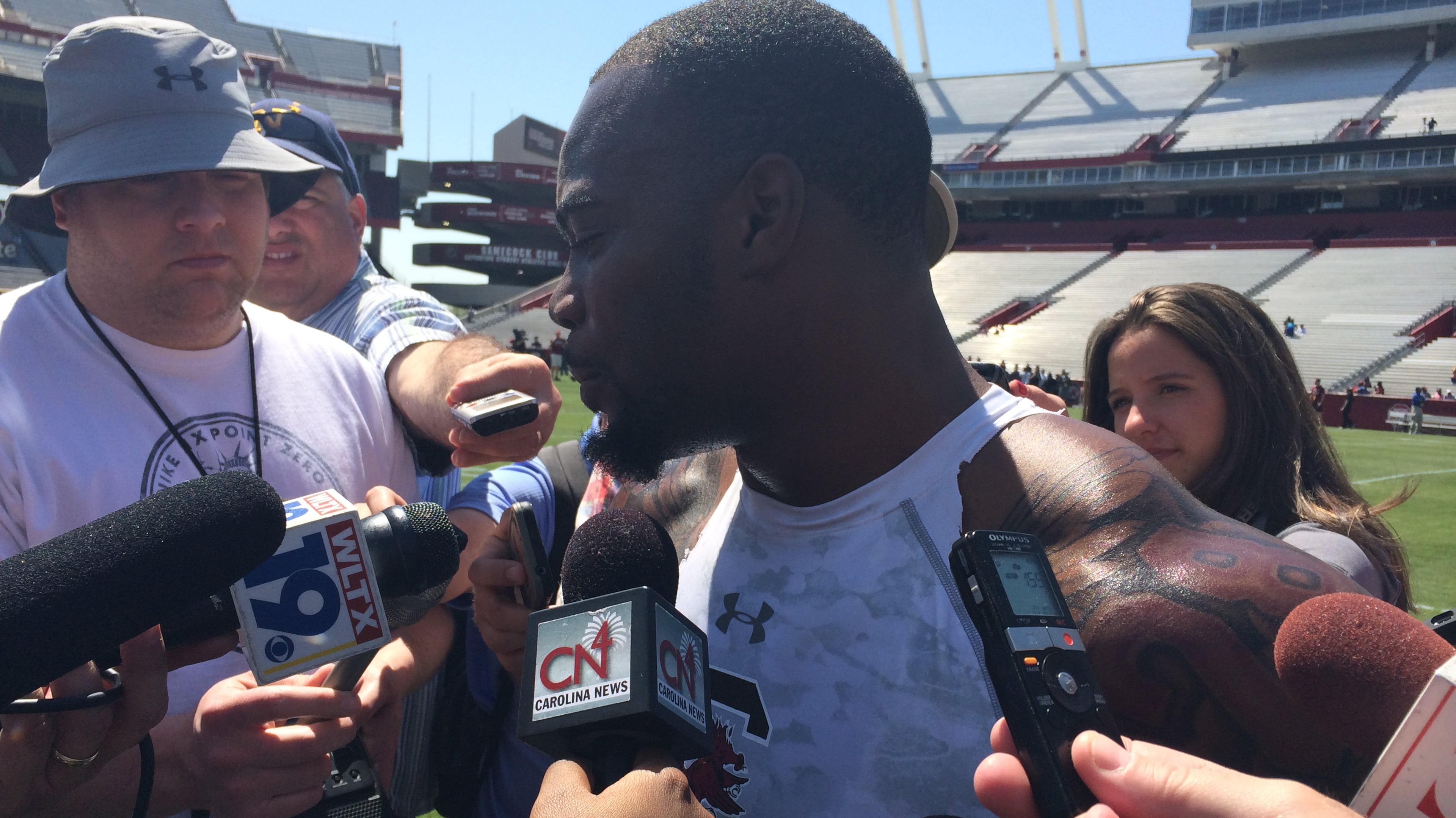 Running back Mike Davis (Stephenson High) talking to the media after South Carolina's Pro Day on Wednesday. (By D. Orlando Ledbetter/DLedbetter@ajc.com)