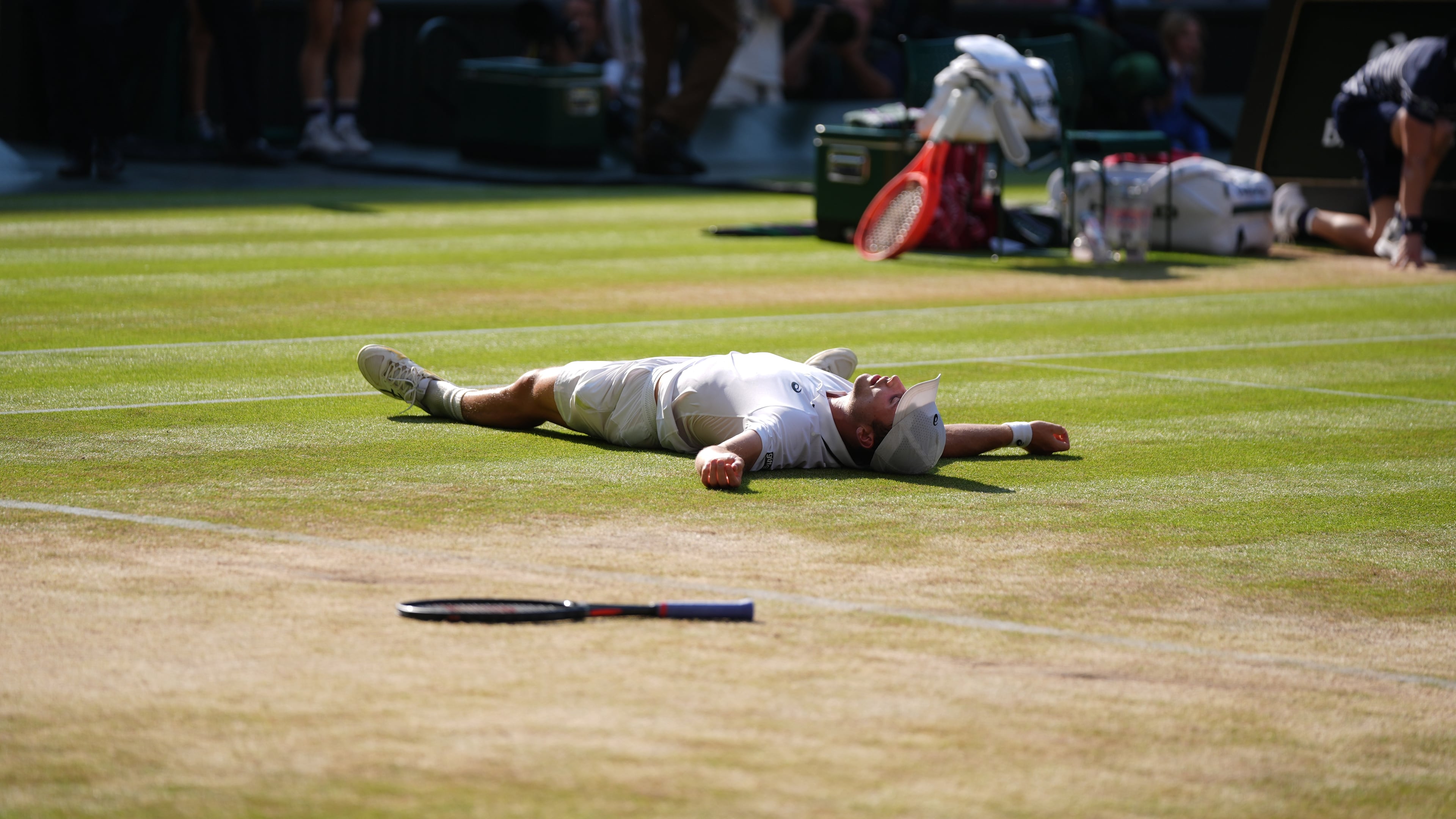 Arthur Fery of Britain reacts to winning against Flavio Cobolli of Italy in their quarter-final men's singles match at the Wimbledon Tennis Championships in London, Wednesday, July 8, 2026. (AP Photo/Maja Smiejkowska)