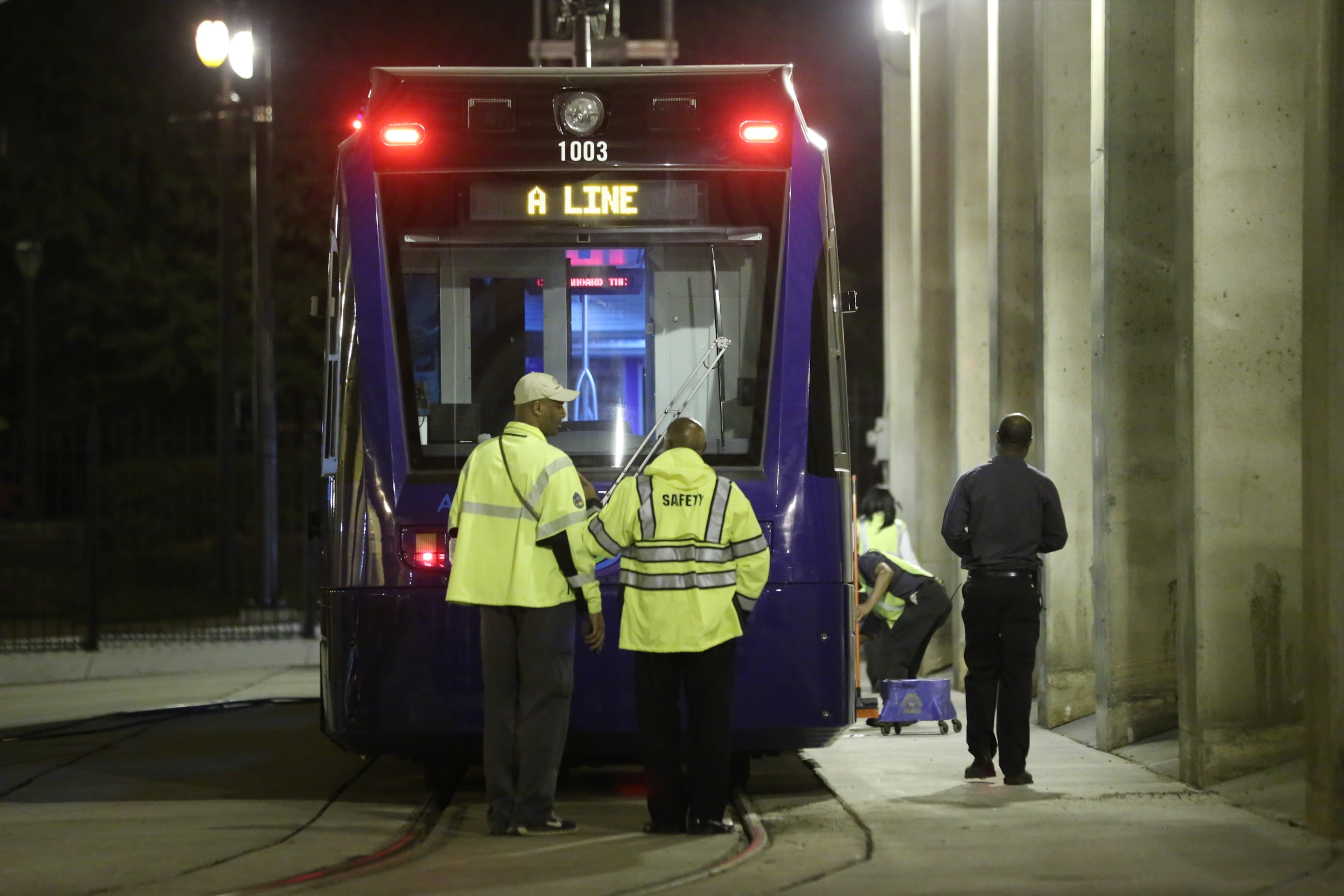 Cleanup begins on Atlanta streetcars vandalized on Sept. 22, 2015. Police Tuesday were working to determine who vandalized several Atlanta streetcars overnight.The streetcars were spray painted with large graffiti while parked for the night at the streetcar maintenance barn under the Downtown Connector near Auburn and Edgewood avenues.The vandalism was reported to authorities about 3:30 a.m. Tuesday, according to Atlanta police dispatchers.