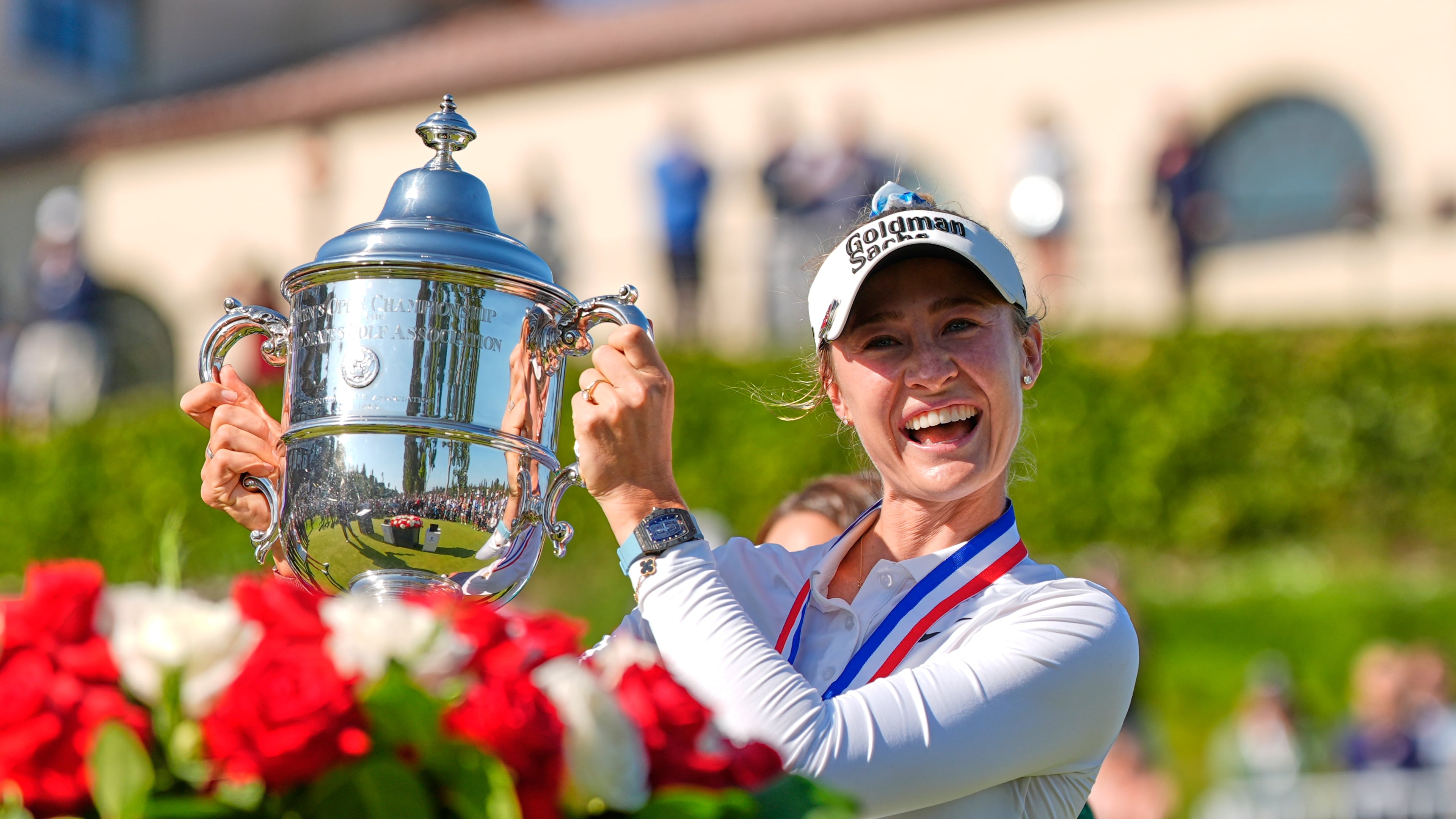Nelly Korda holds up the trophy after winning the U.S. Women's Open golf tournament Sunday, June 7, 2026, in the Pacific Palisades area of Los Angeles. (AP Photo/Ashley Landis)