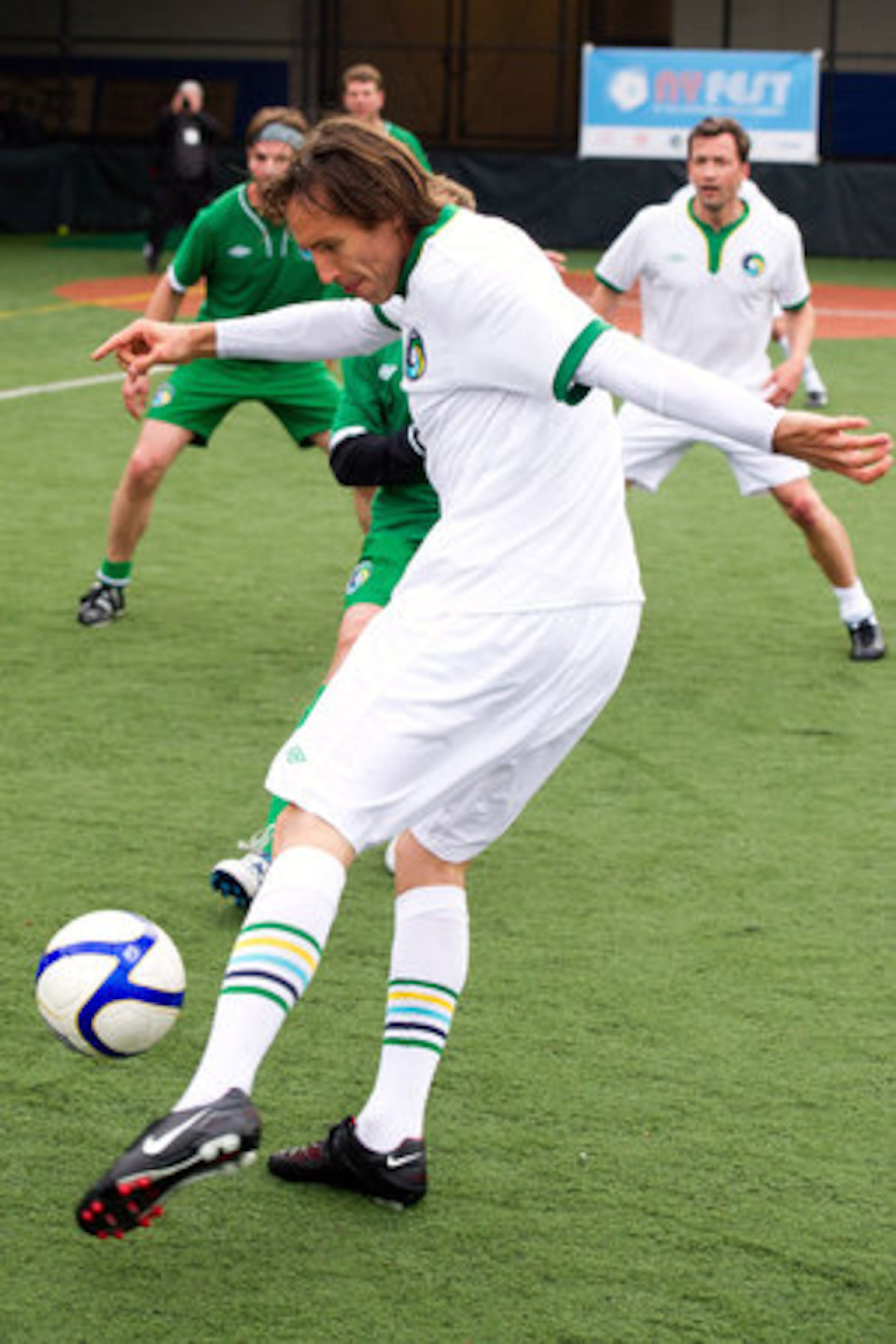 Steve Nash plays soccer during the NYFEST celebrity soccer match.