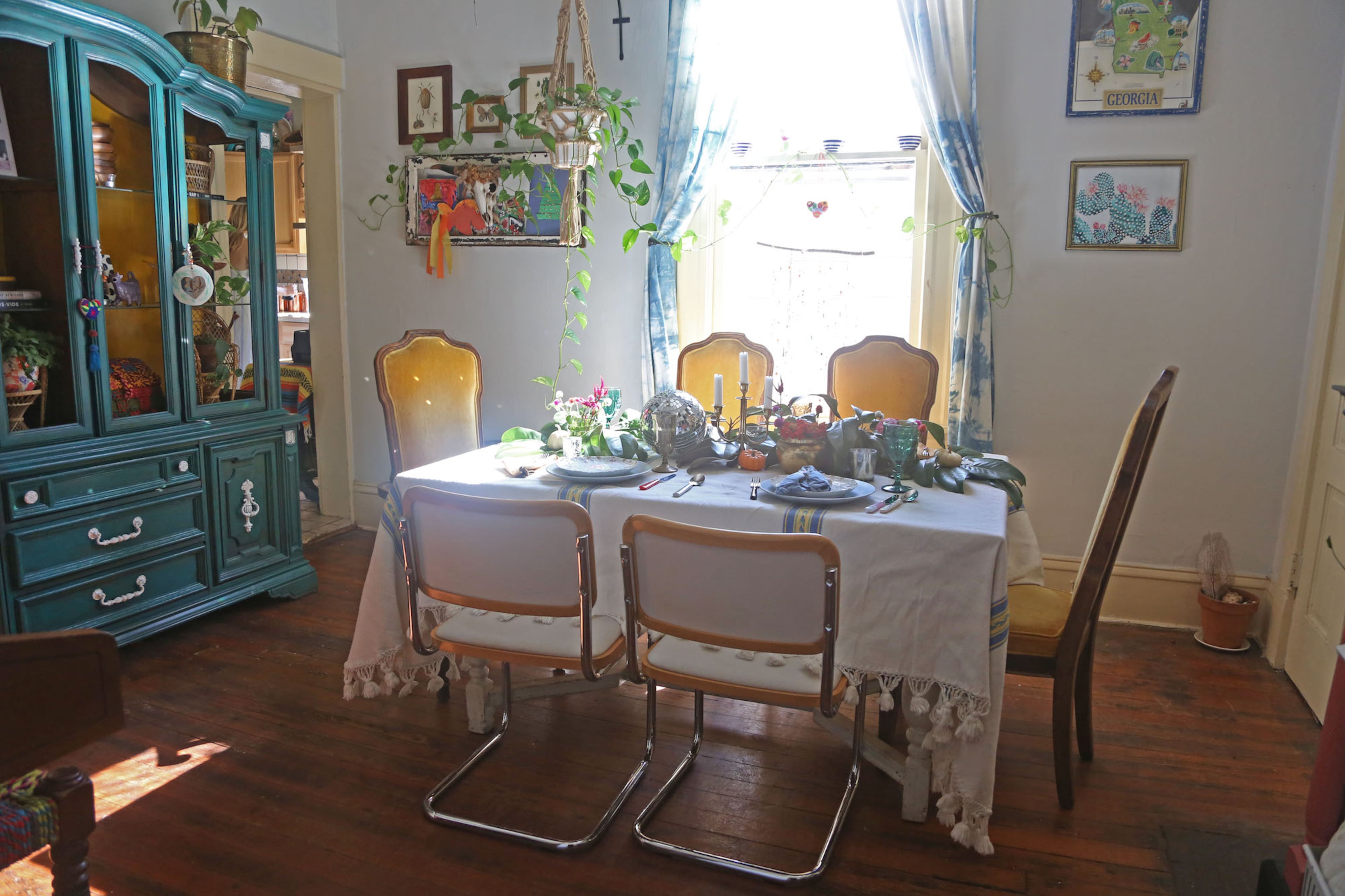 The dining room is a favorite spot because it gets the best light throughout the day, said homeowner Augusta Wheeler. "It's home to many of my plants," she said.