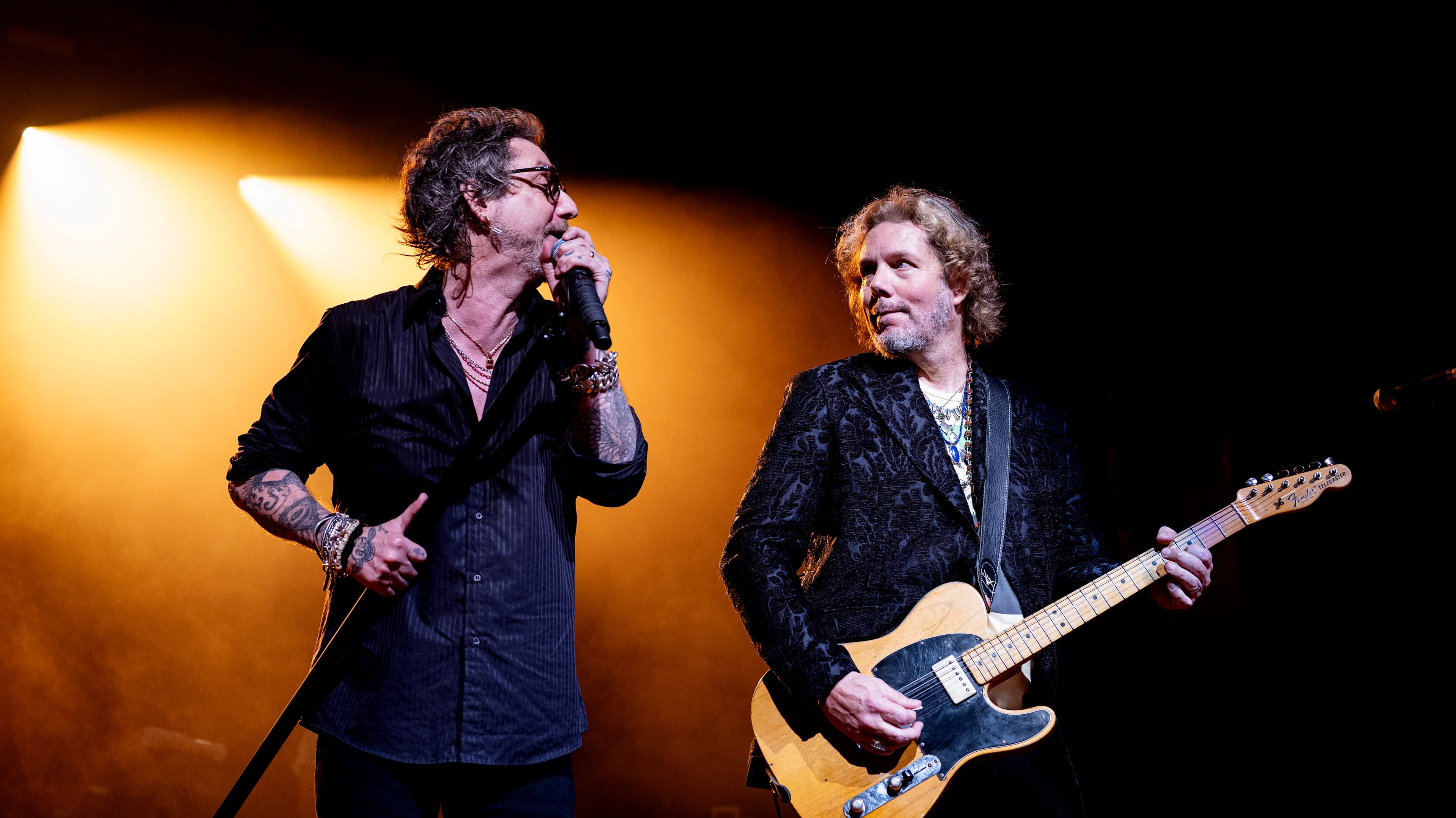Legendary Atlanta-bred Southern rock band the Black Crowes (including, from left, brothers Chris and Rich Robinson) will perform shows in Alpharetta and Augusta to promote their latest album "A Pound of Feathers." (Courtesy of the Black Crowes)