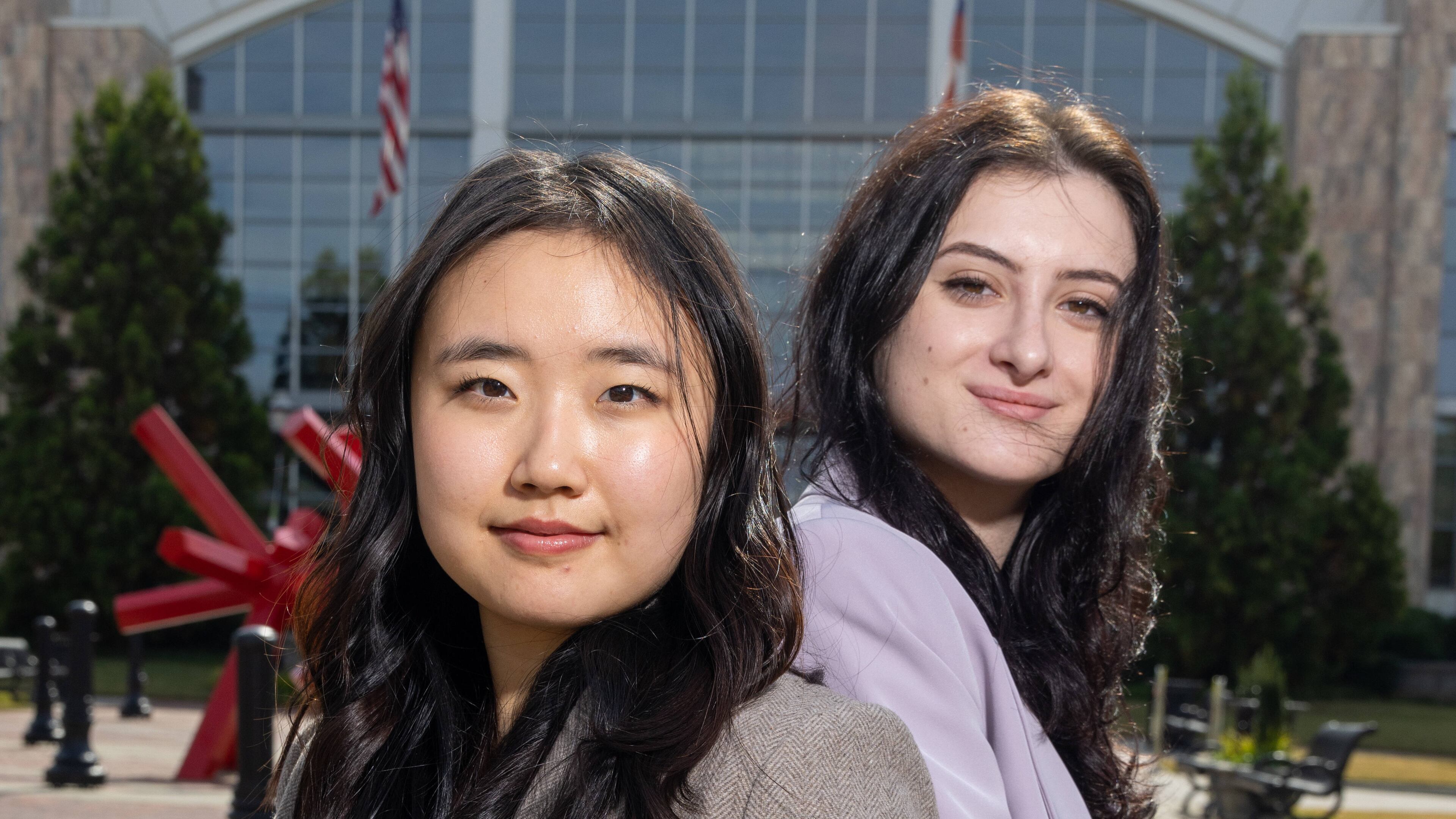 Portrait of Suann Kim & Nela Vintrlikova,
founders of SUNE Translate Inc., at Suwanee Town Center Park. For the Everyday Heroes holiday package. PHIL SKINNER FOR THE ATLANTA JOURNAL-CONSTITUTION