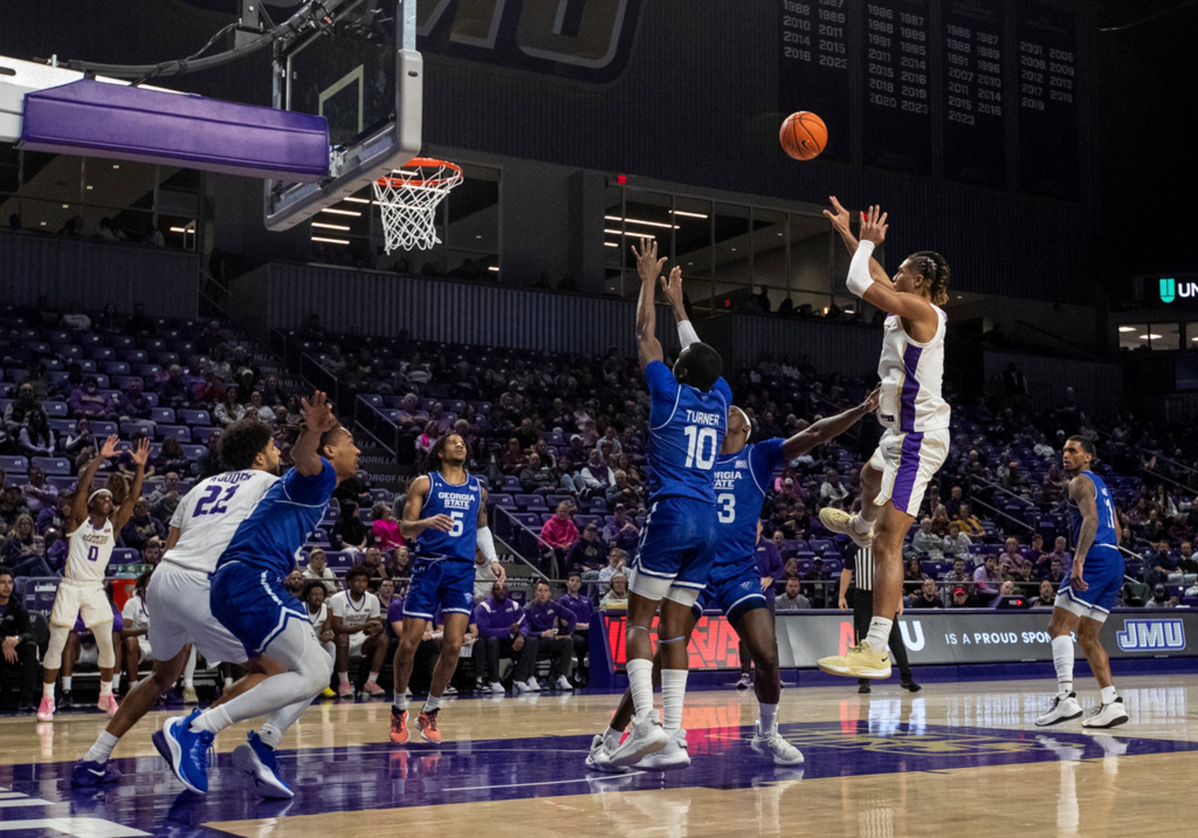 James Madison forward T.J. Bickerstaff shoots against Georgia State during the second half of an NCAA college basketball game in Harrisonburg, Va., Thursday, Feb. 15, 2024. (Daniel Lin/Daily News-Record via AP)