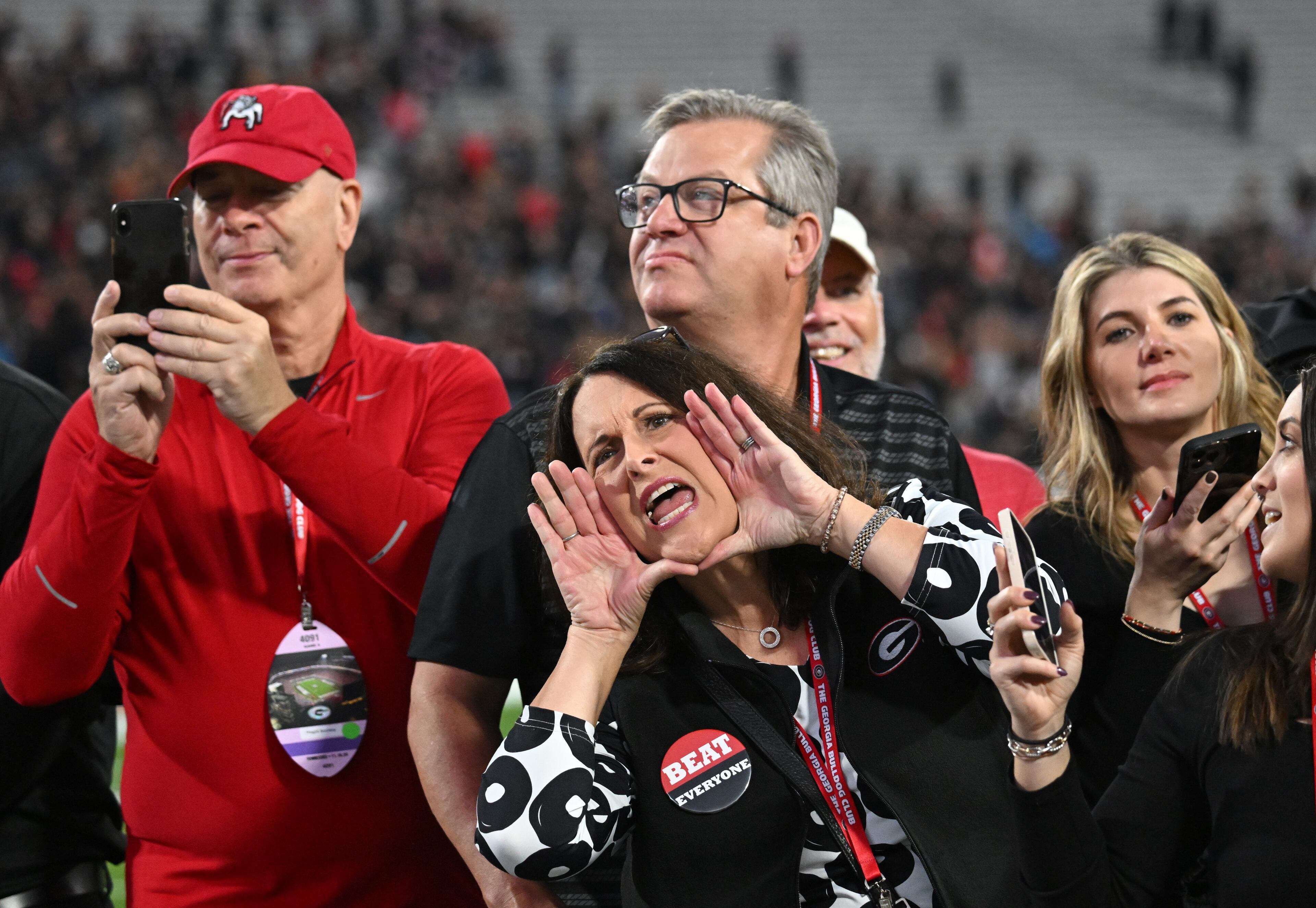 Georgia fans cheer as players and staff arrive during Dawgs Walk before an NCAA football game between Georgia and Tennessee at Sanford Stadium, Saturday, November 16, 2024, in Athens. (Hyosub Shin / AJC)