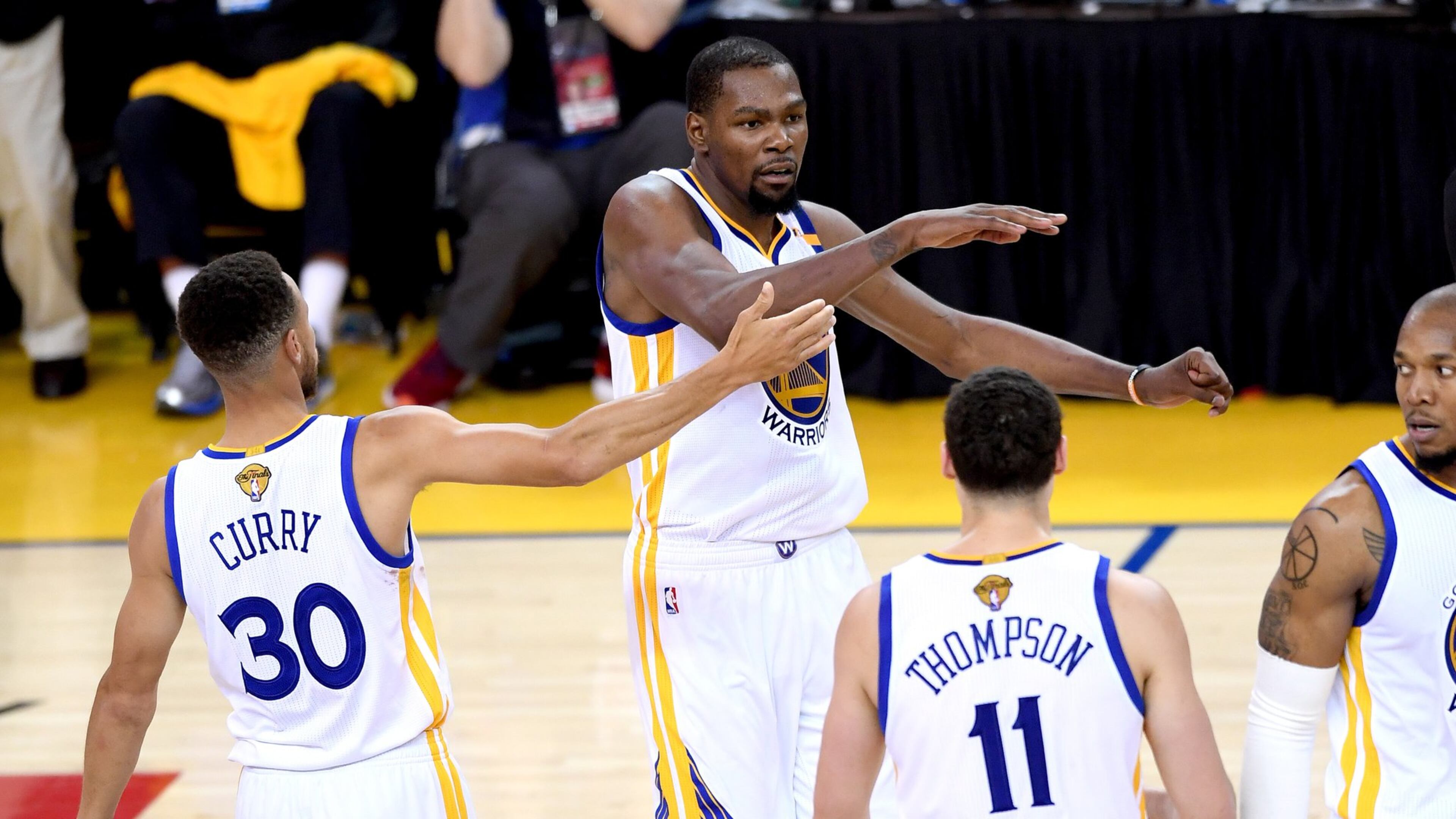 Kevin Durant and the Golden State Warriors react in Game 2 of the 2017 NBA Finals against the Cleveland Cavaliers at ORACLE Arena on June 4, 2017 in Oakland, California. (Photo by Thearon W. Henderson/Getty Images)