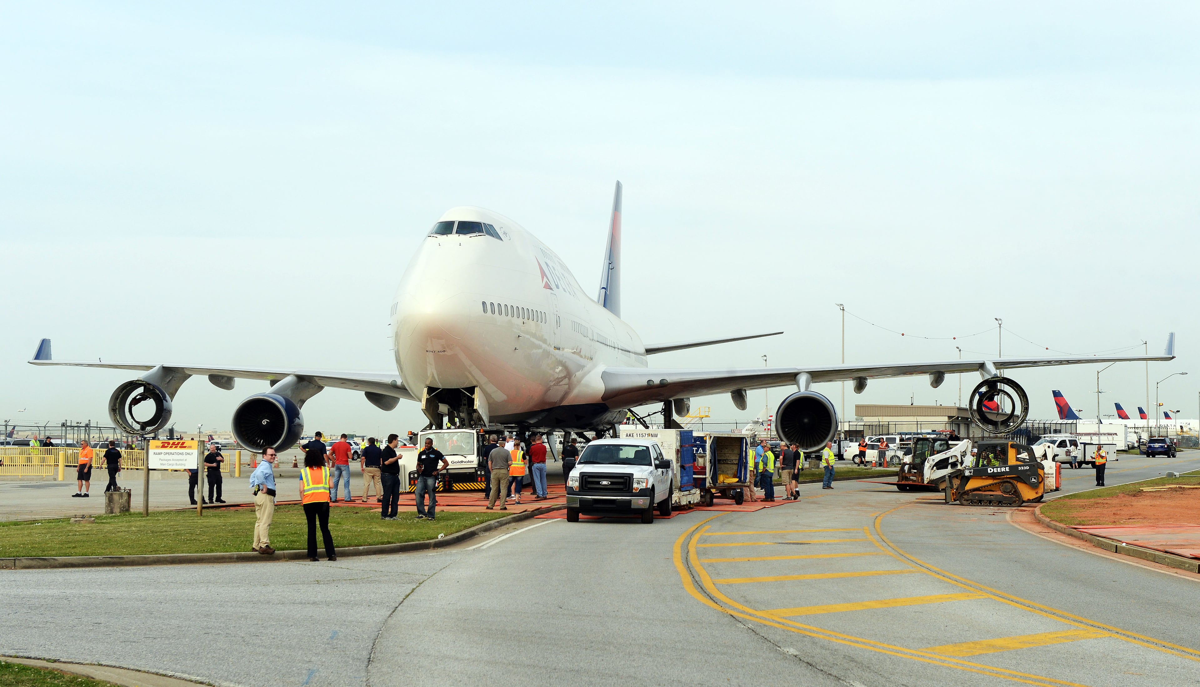 APRIL 30, 2016 ATLANTA Crews move a retired Boeing 747-400 to the Delta Flight museum Saturday, April 30, 2016. Delta Air Lines Ship 6301 made its final journey to Delta’s Atlanta world headquarters campus in preparation for the Delta Flight Museum's latest exhibit featuring the retired aircraft. On September 9, 2015, Delta retired Ship 6301, the first Boeing 747-400 aircraft manufactured for a commercial airline, after its final flight from Honolulu to Atlanta. KENT D. JOHNSON /kdjohnson@ajc.com #delta747experience