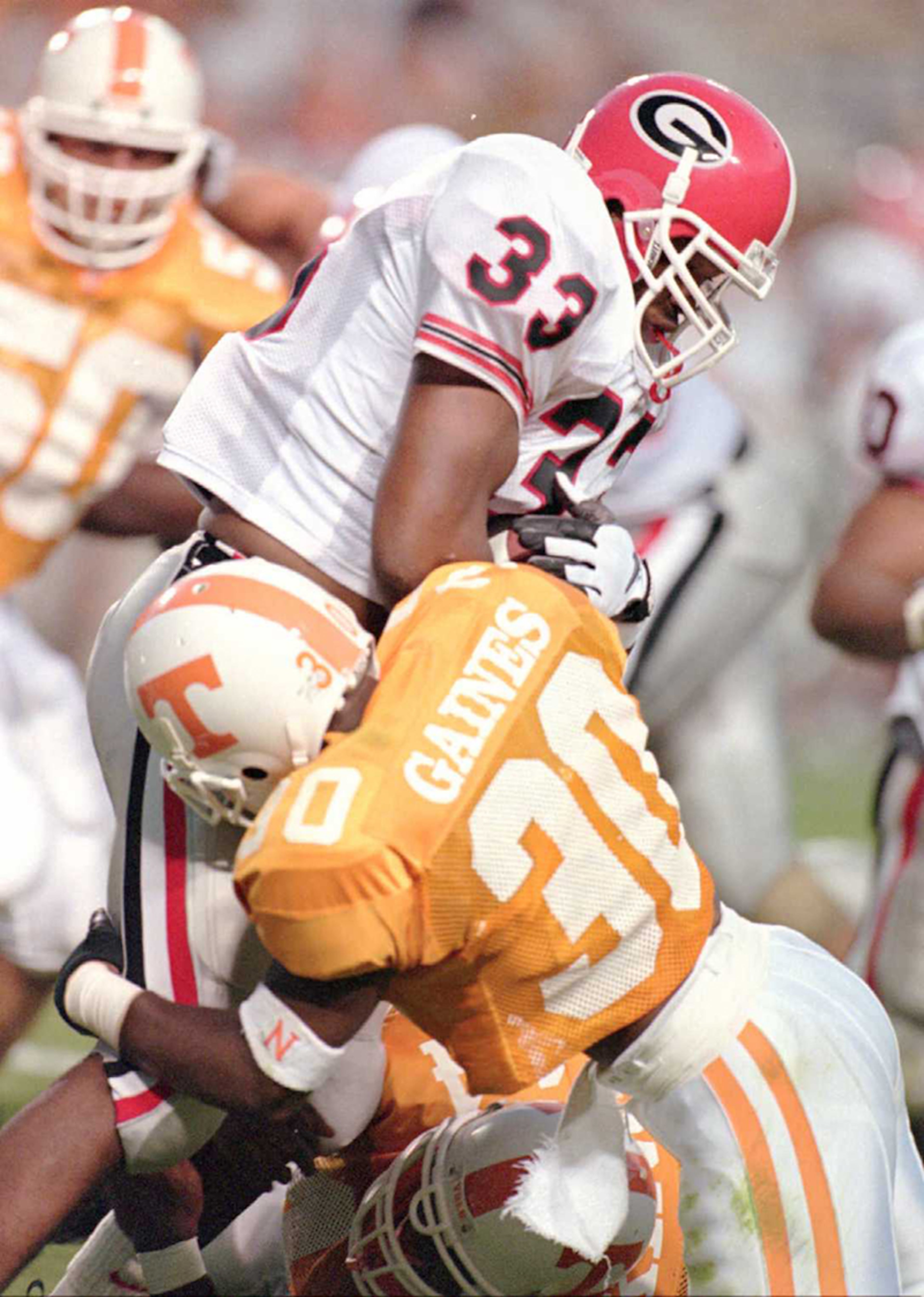 (8) Tennessee 30, Georgia 27 in Knoxville, Tenn.: Tennessee freshman placekicker Jeff Hall booted a game-winning 34-yard field goal with 10 seconds remaining to lift the Vols to a dramatic 30-27 win over Georgia. Peyton Manning passed for 349 yards and two scores and tailback Jay Graham added 137 yards on the ground. UGA's Robert Edwards gained 156 yards and two TDs before leaving the game with injury in the fourth quarter. College Gameday pick? Tennessee.