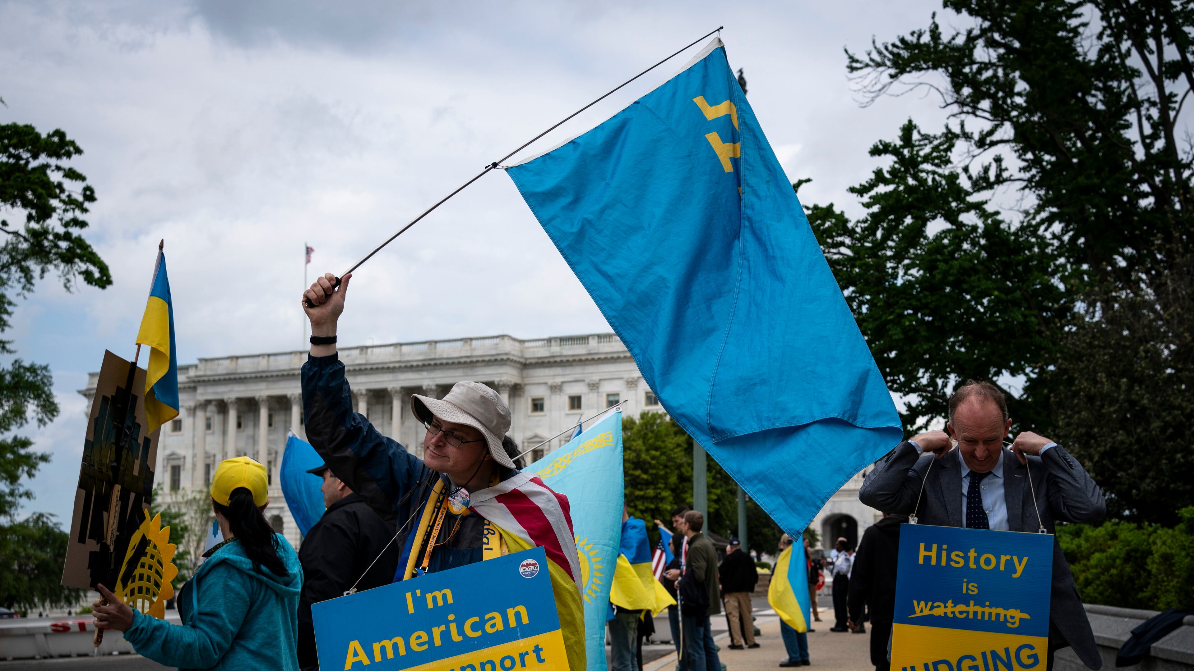 Demonstrators in support of Ukraine rally outside the Capitol in Washington on Saturday morning, April 20, 2024. The House on Saturday was heading toward passage of a $95 billion foreign aid package for Ukraine, Israel and Taiwan, as House Speaker Mike Johnson put his job on the line to advance the long-stalled legislation in defiance of hard-liners from his own party. (Haiyun Jiang/The New York Times)