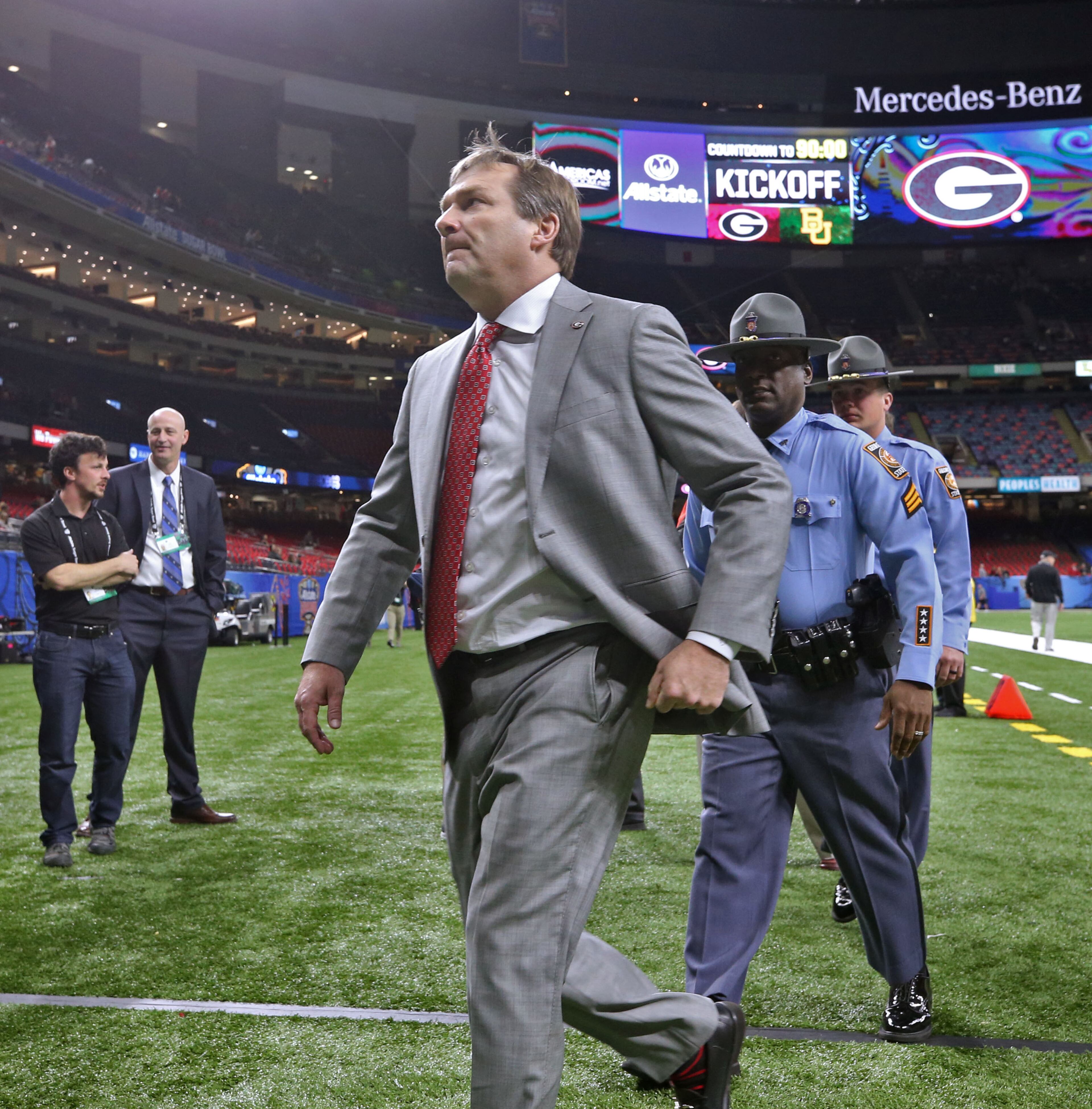 Georgia Bulldogs head coach Kirby Smart walks the field. Bob Andres bandres@ajc.com