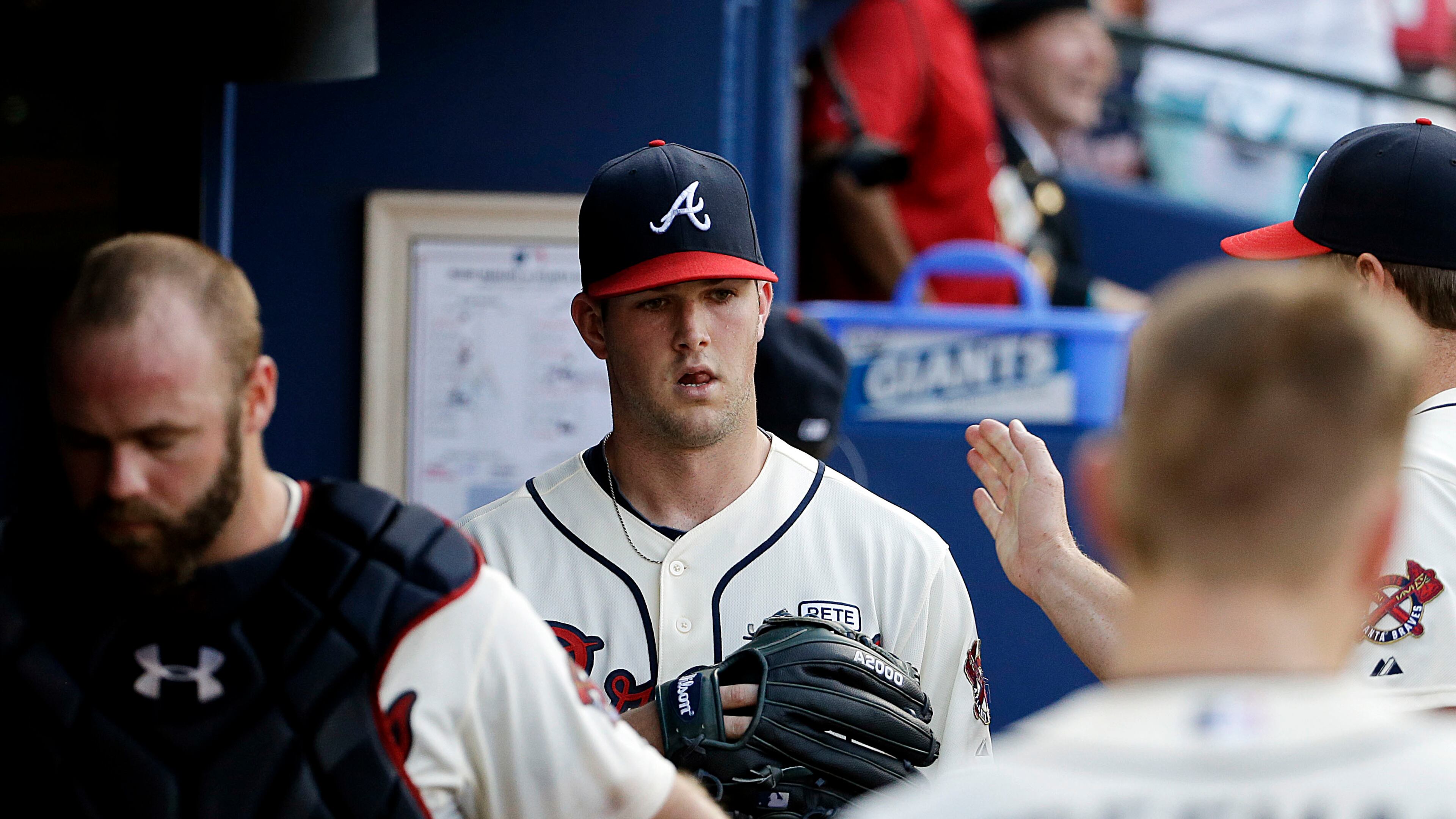 Alex Wood (center) allowed five hits and and zero runs, while striking out 12 in 8 innings of work Sunday, Aug. 31, 2014, against the Miami Marlins at Turner Field in Atlanta.