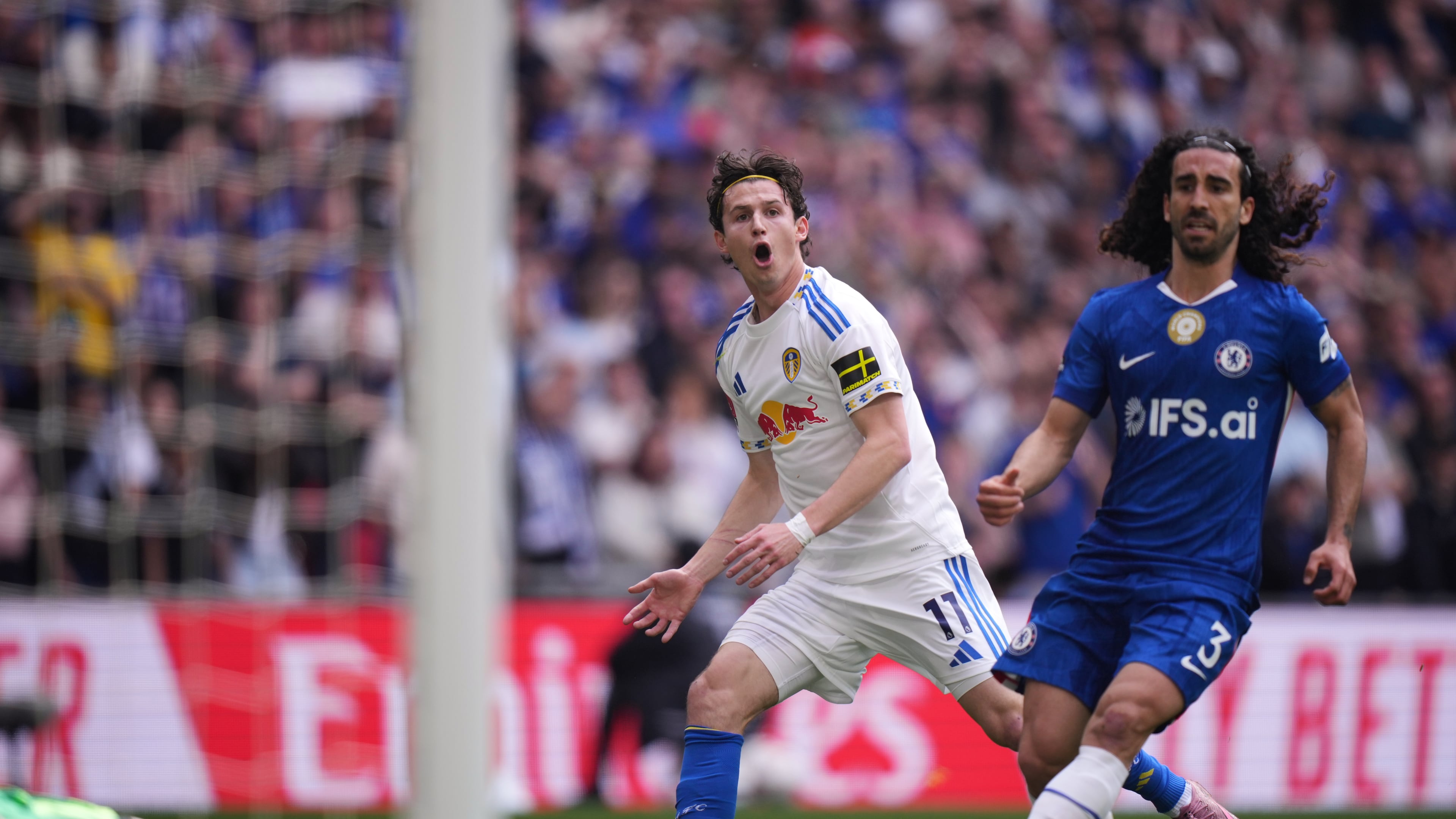 Leeds' Brenden Aaronson, center, reacts after failing to score during the FA Cup semifinal soccer match between Chelsea and Leeds in London, England, Sunday, April 26, 2026. (AP Photo/Alastair Grant)