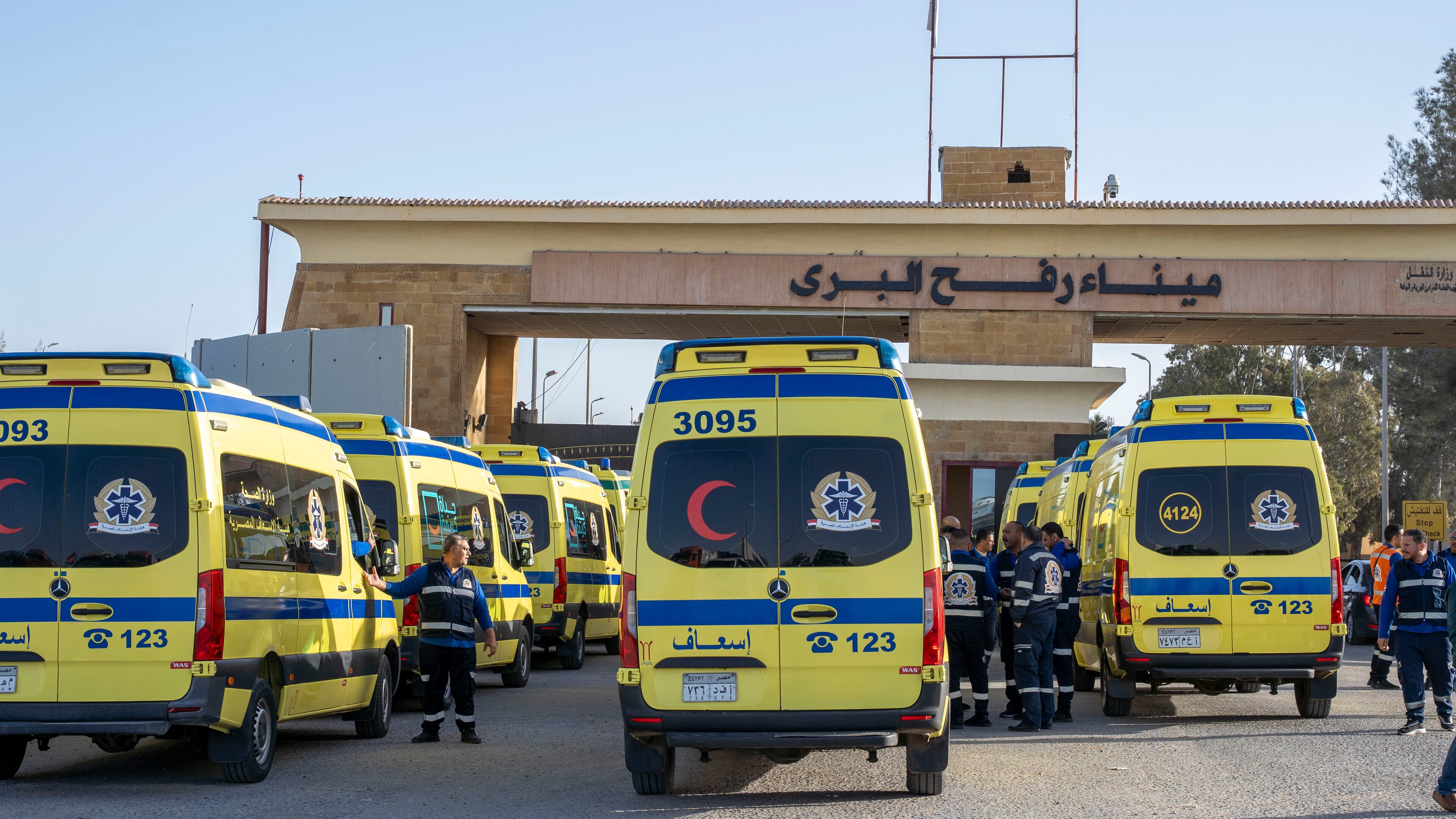 Ambulances line up to enter the Egyptian gate of the Rafah crossing on the way to the Gaza Strip, in Rafah, Egypt, Sunday, Feb. 1, 2026. (AP Photo/Mohamed Arafat)