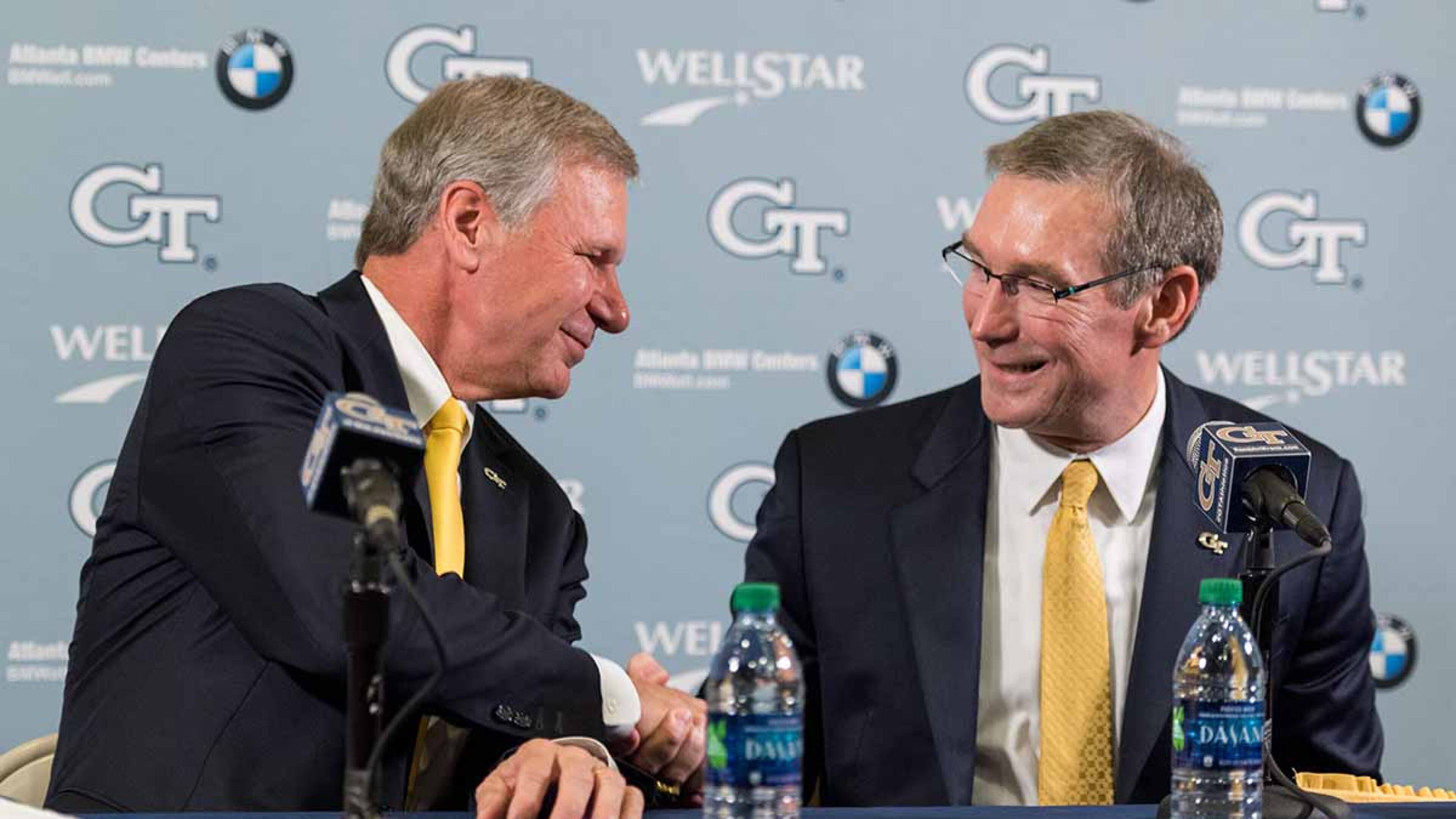Georgia Tech President Bud Peterson and new athletic director Todd Stansbury shake hands on Thursday. (Rob Felt / Georgia Tech)