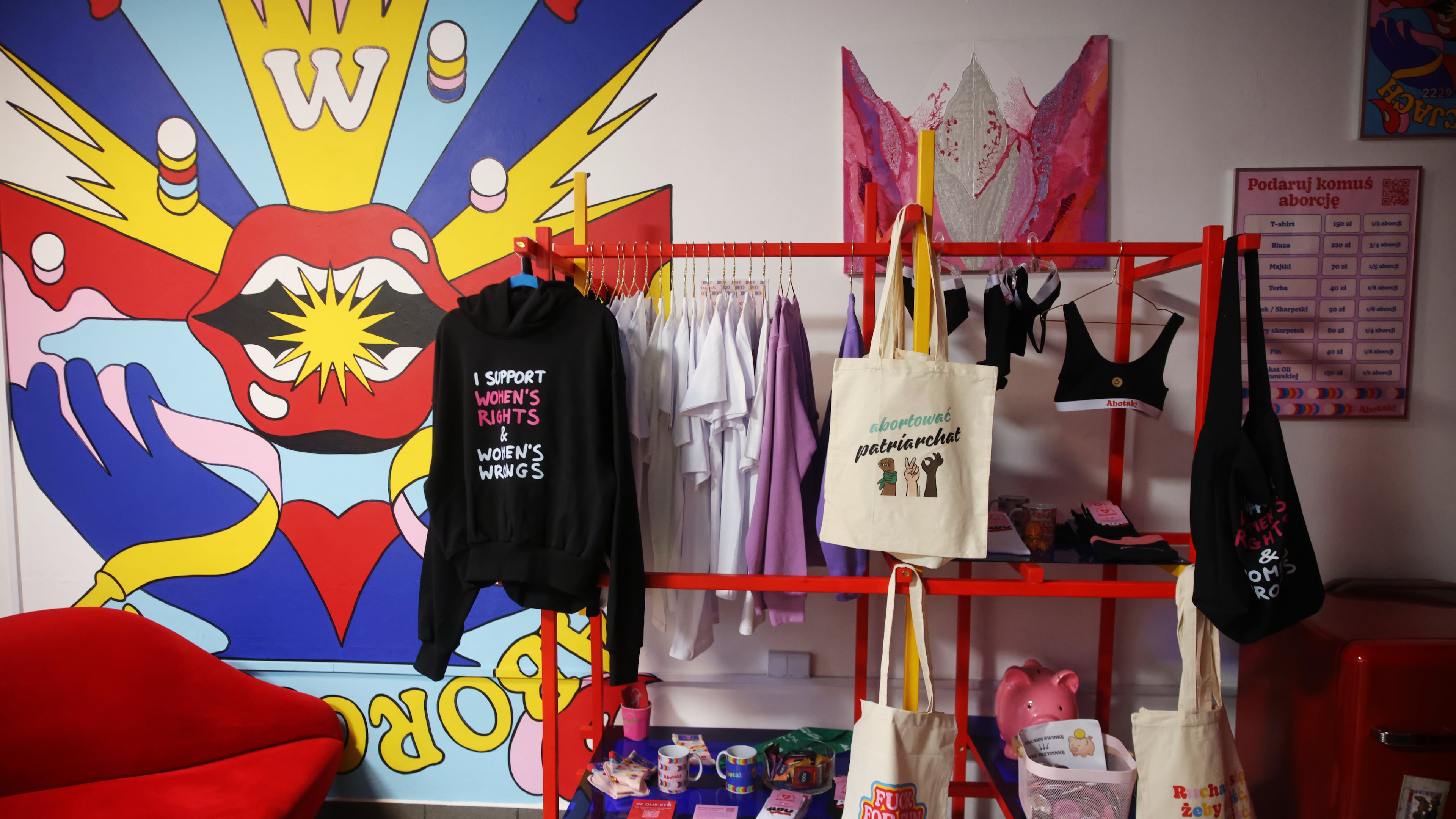 Some merchandise is displayed at an information center about abortion options run by the women's organizations Abortion Dream Team and Women Help Women, in Warsaw, Poland, Thursday, Oct. 22, 2026. (AP Photo/Beata Zawrzel)