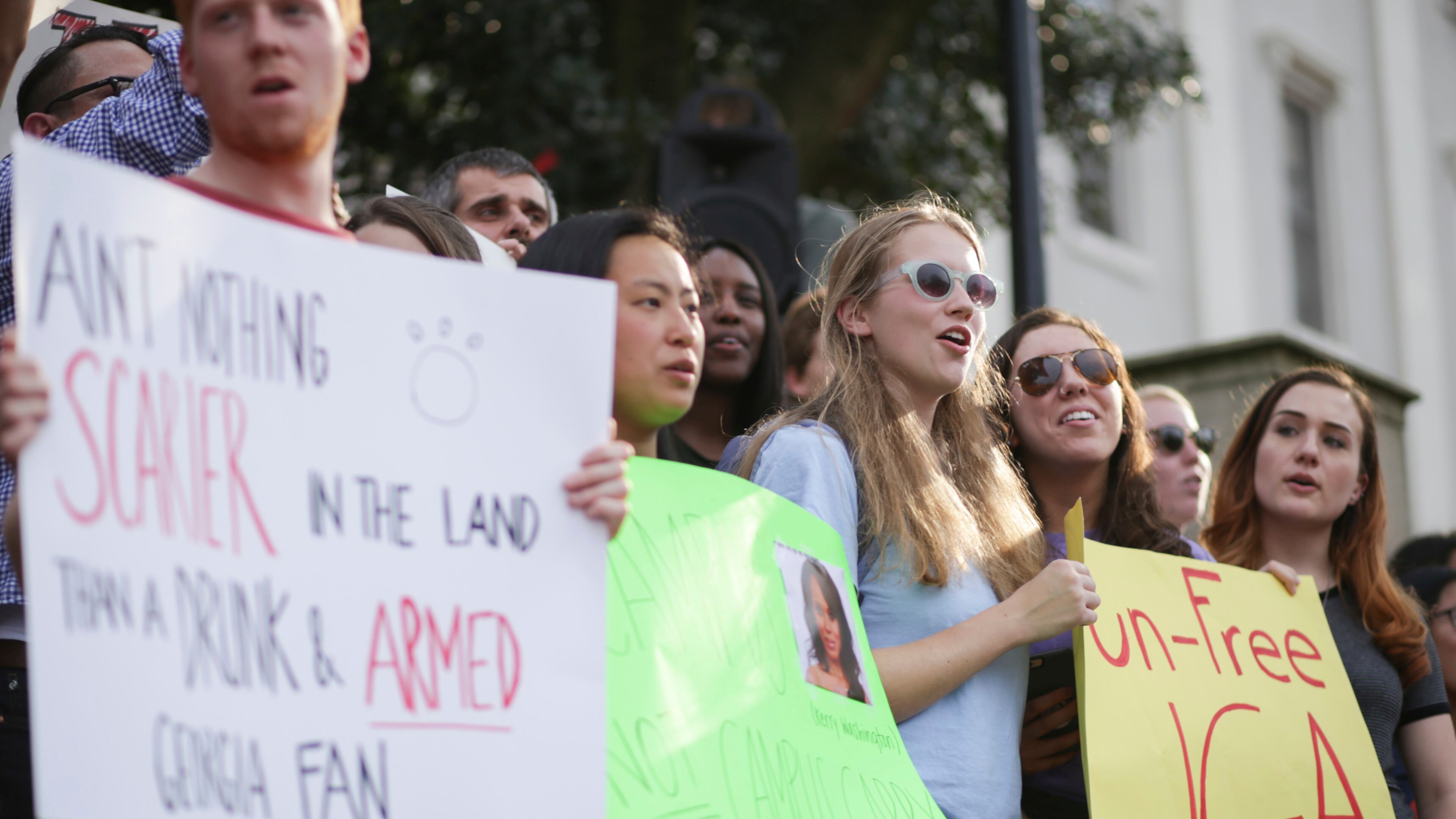At a protest Tuesday, March 21, University of Georgia students gathered at the Arch to oppose the 2017 campus carry bill that passed the Legislature and is now on the governor's desk. (John Roark/ Athens Banner-Herald via AP)