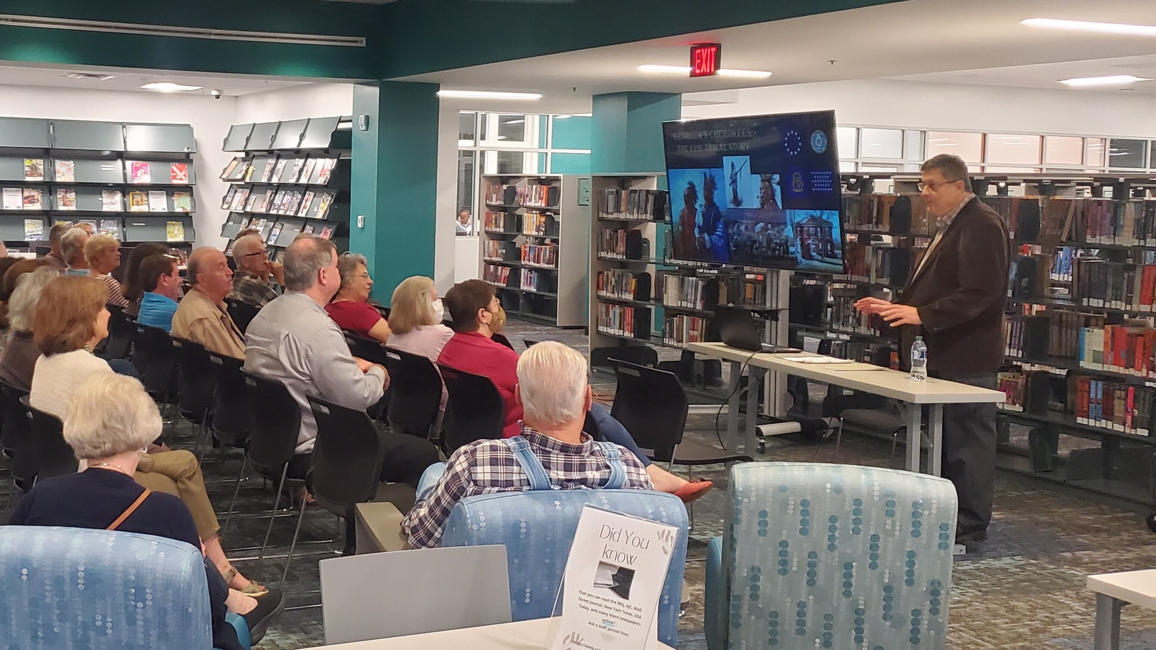 Retired Cobb County librarians James Camp (right) volunteers his expertise to present programs around history and culture.