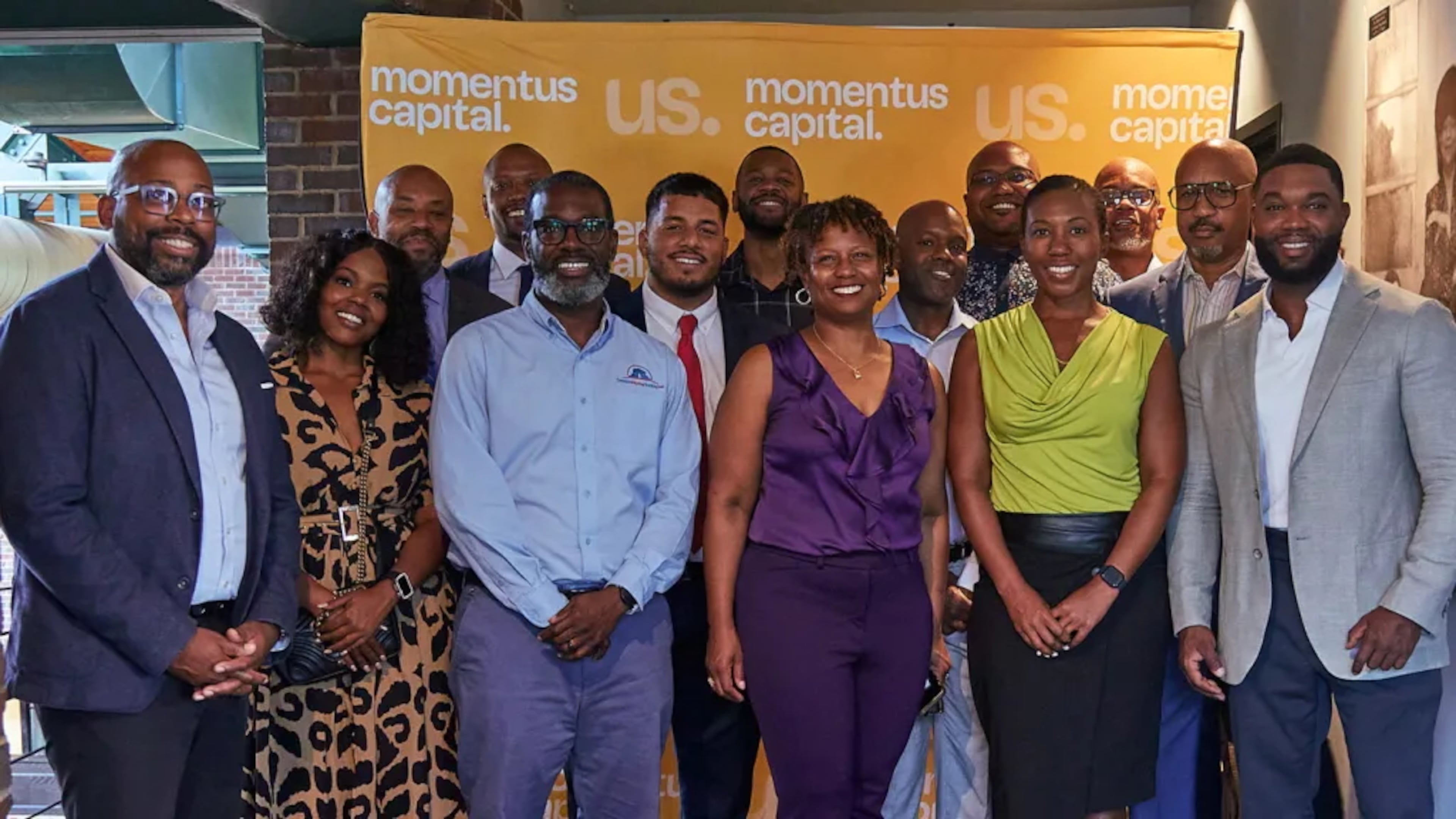 Ellis Carr (far left) is shown with a group of real estate developers at a kickoff event for a nine-month training program by Momentus Capital in September 2024.