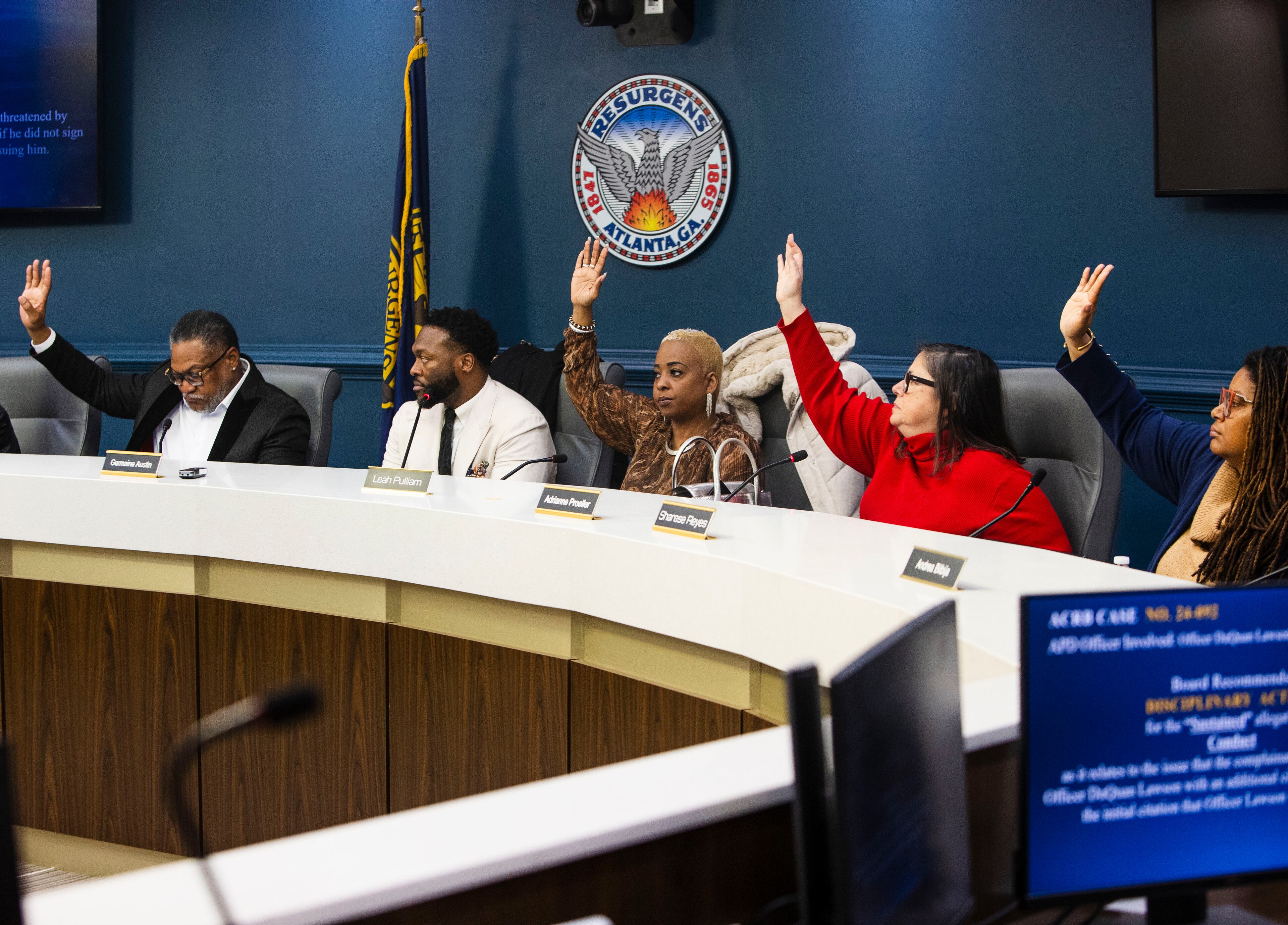 Members of the Atlanta Citizen Review Board vote during a meeting in December.